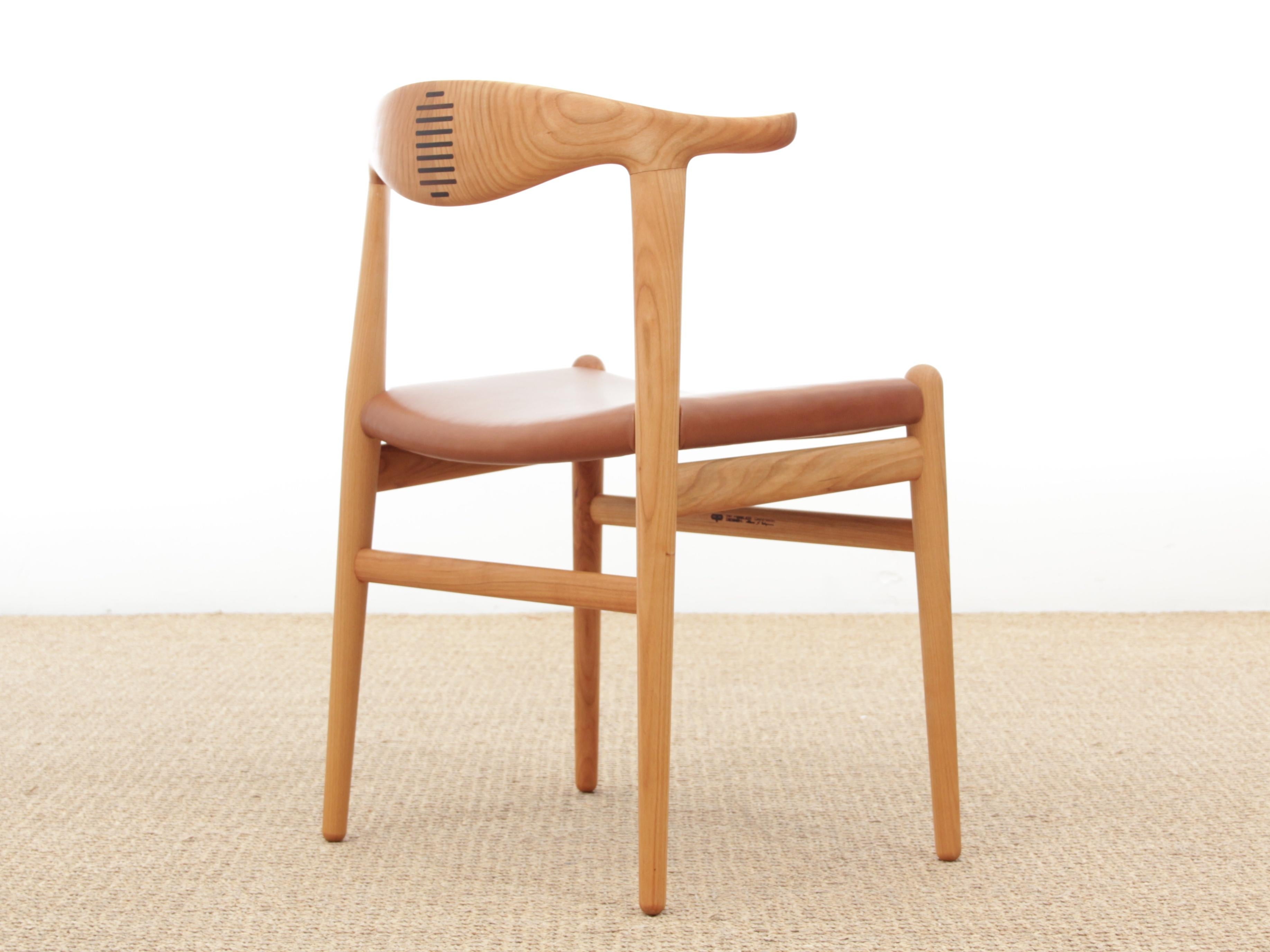 https://a.1stdibscdn.com/mid-century-modern-scandinavian-chair-model-cow-horn-pp-505-by-hans-wegner-new-for-sale-picture-5/f_17192/1555518057346/IMG_5027_master.JPG