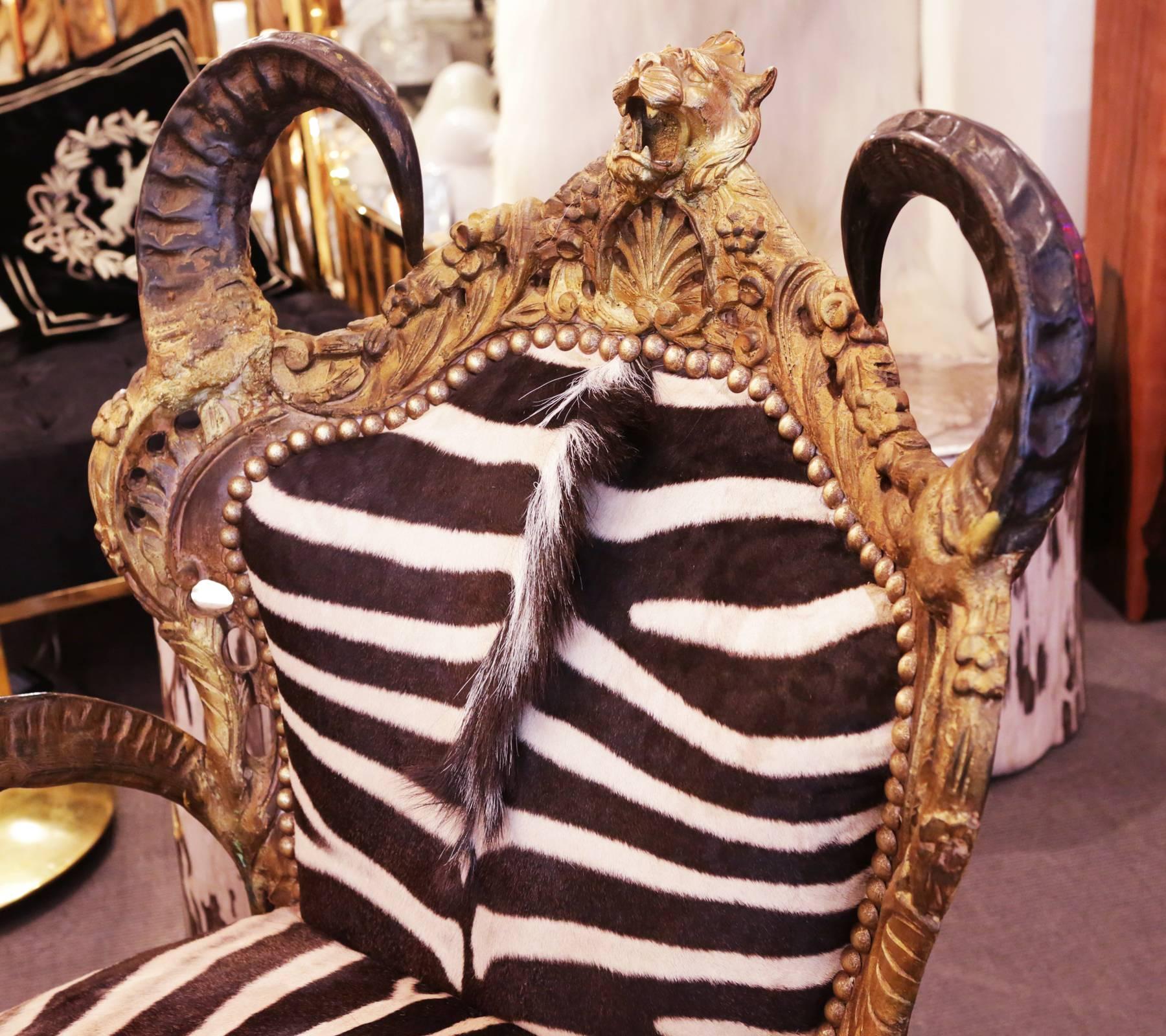 https://a.1stdibscdn.com/zebra-and-lion-head-armchair-for-sale-picture-5/archivesE/upload/f_14282/1524845573740/IMG_5030_master.JPG
