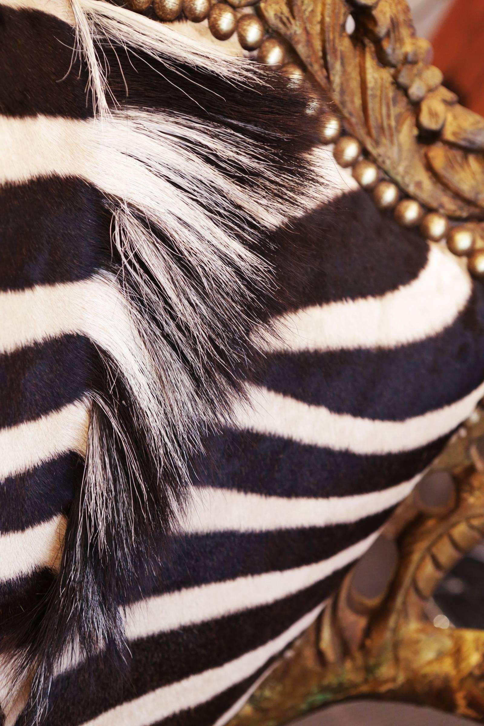 https://a.1stdibscdn.com/zebra-and-lion-head-armchair-for-sale-picture-7/archivesE/upload/f_14282/1524845594559/IMG_5054_master.JPG