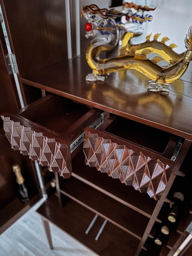 https://a.1stdibscdn.com/modern-dark-brown-ash-solid-wood-bar-cabinet-for-sale-picture-3/f_82682/f_387126021709661888854/IMG_5394_jpg_1__master.jpg?width=768