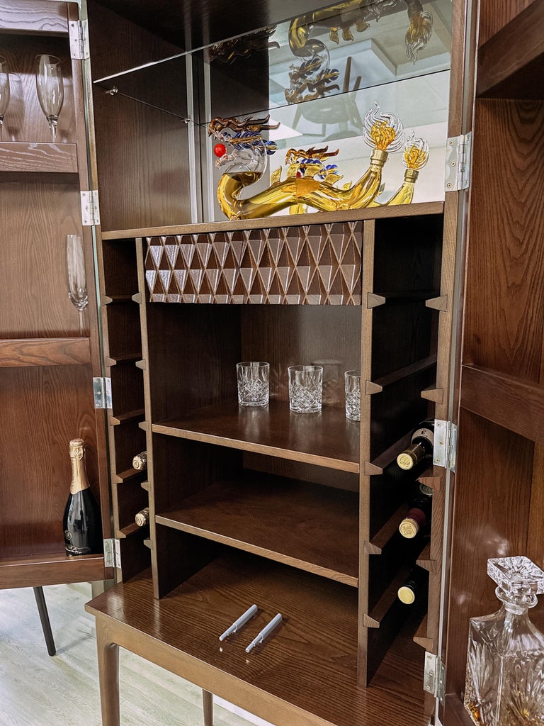 https://a.1stdibscdn.com/modern-dark-brown-ash-solid-wood-bar-cabinet-for-sale-picture-7/f_82682/f_387126021709661893339/IMG_5421_1__master.jpg?width=768