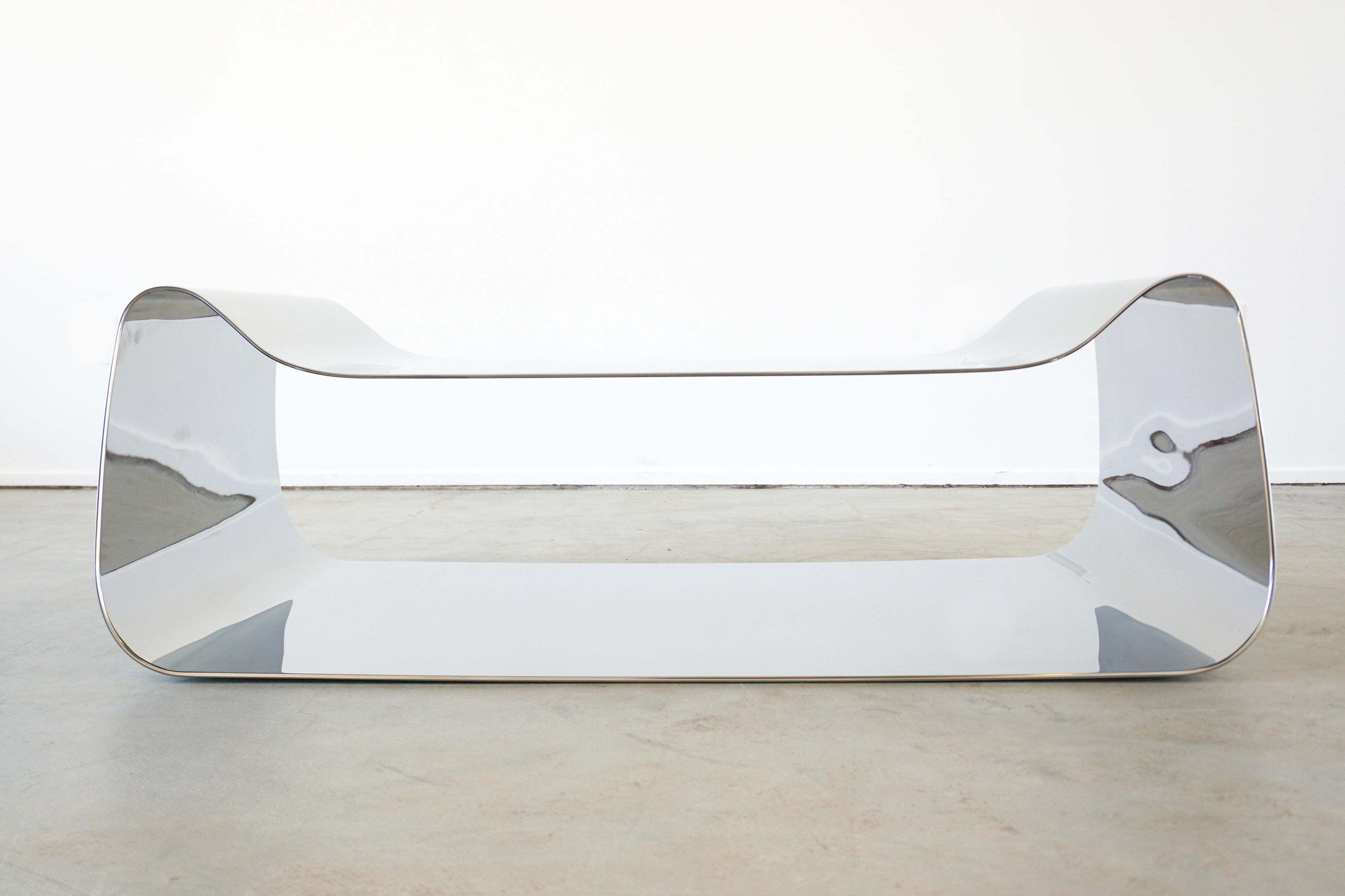 https://a.1stdibscdn.com/titanium-coffee-table-by-william-emmerson-for-sale-picture-2/f_12192/f_389737621711150216518/IMG_5601_master.jpeg