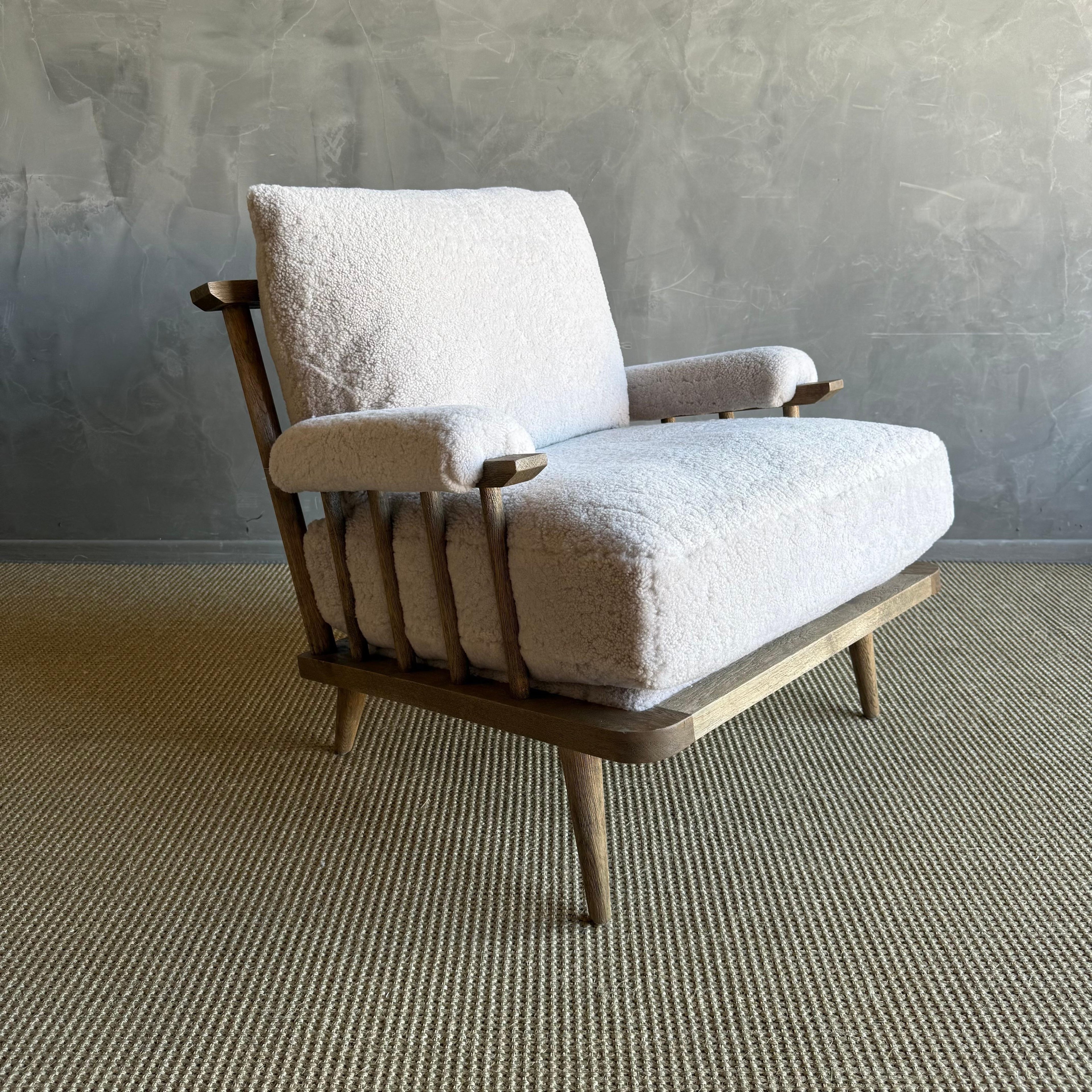https://a.1stdibscdn.com/frances-white-oak-chair-upholstered-in-100-genuine-sheepskin-for-sale-picture-6/f_18223/f_492177521773434727551/IMG_5698_master.jpeg
