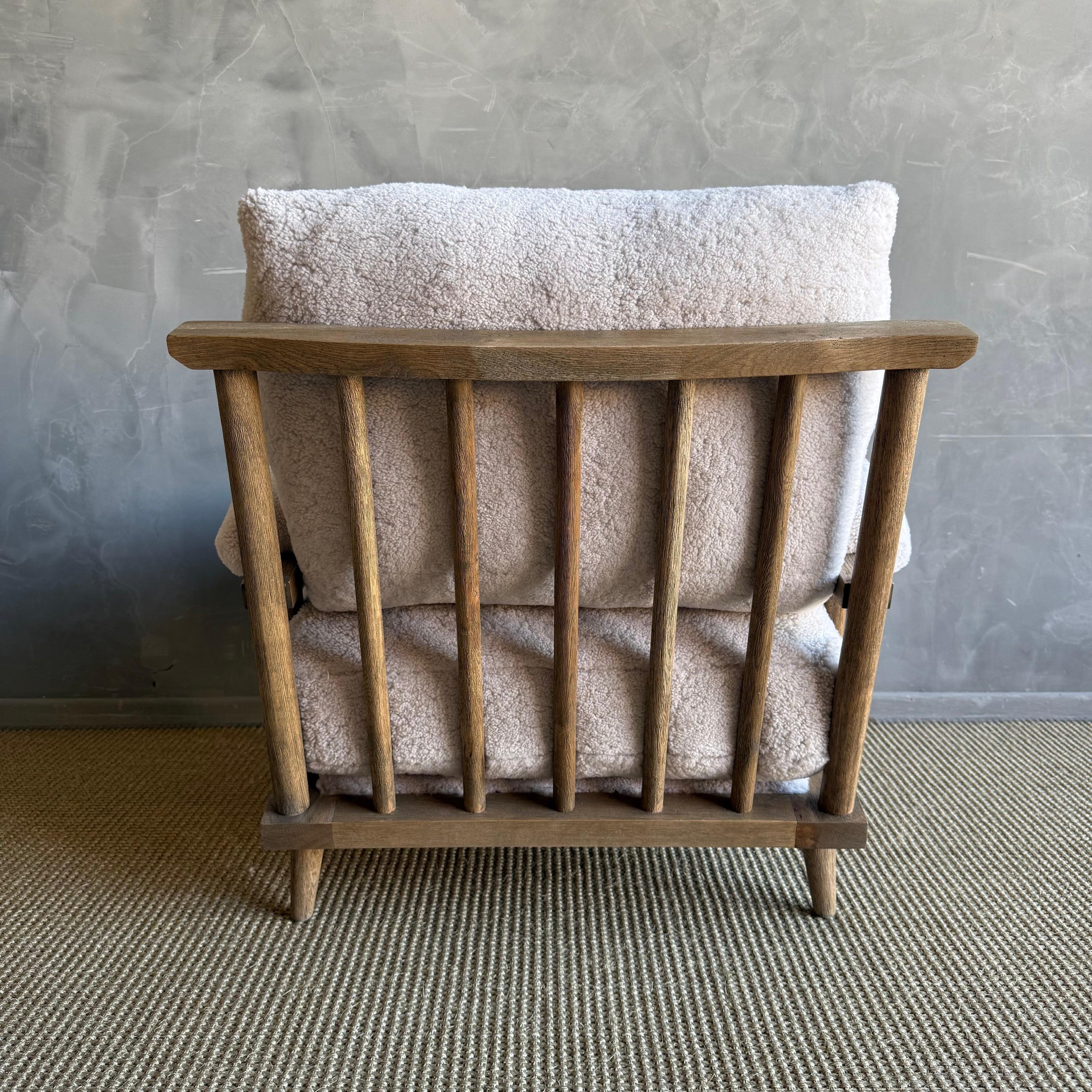 https://a.1stdibscdn.com/frances-white-oak-chair-upholstered-in-100-genuine-sheepskin-for-sale-picture-10/f_18223/f_492177521773434734029/IMG_5702_master.jpeg