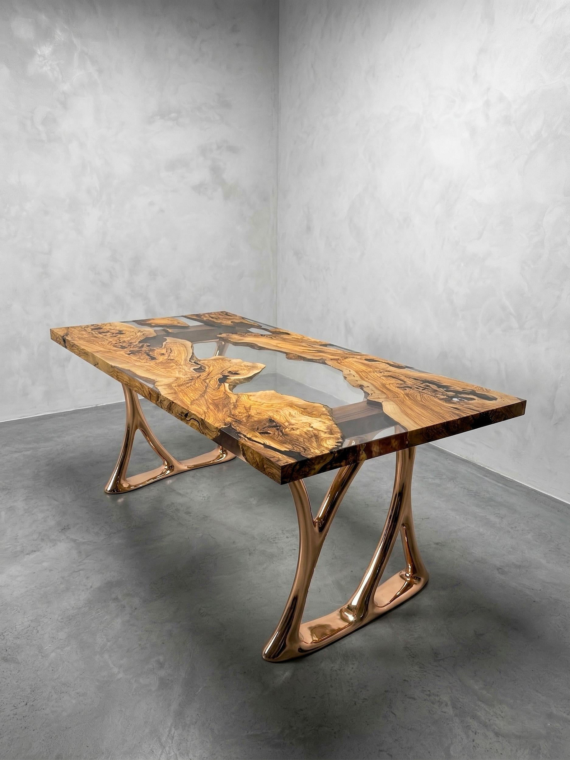 https://a.1stdibscdn.com/aluminium-casting-legs-with-olive-wood-crystal-clear-epoxy-resin-dining-table-for-sale-picture-5/f_91932/f_495752221775652557937/IMG_5752_master.JPG