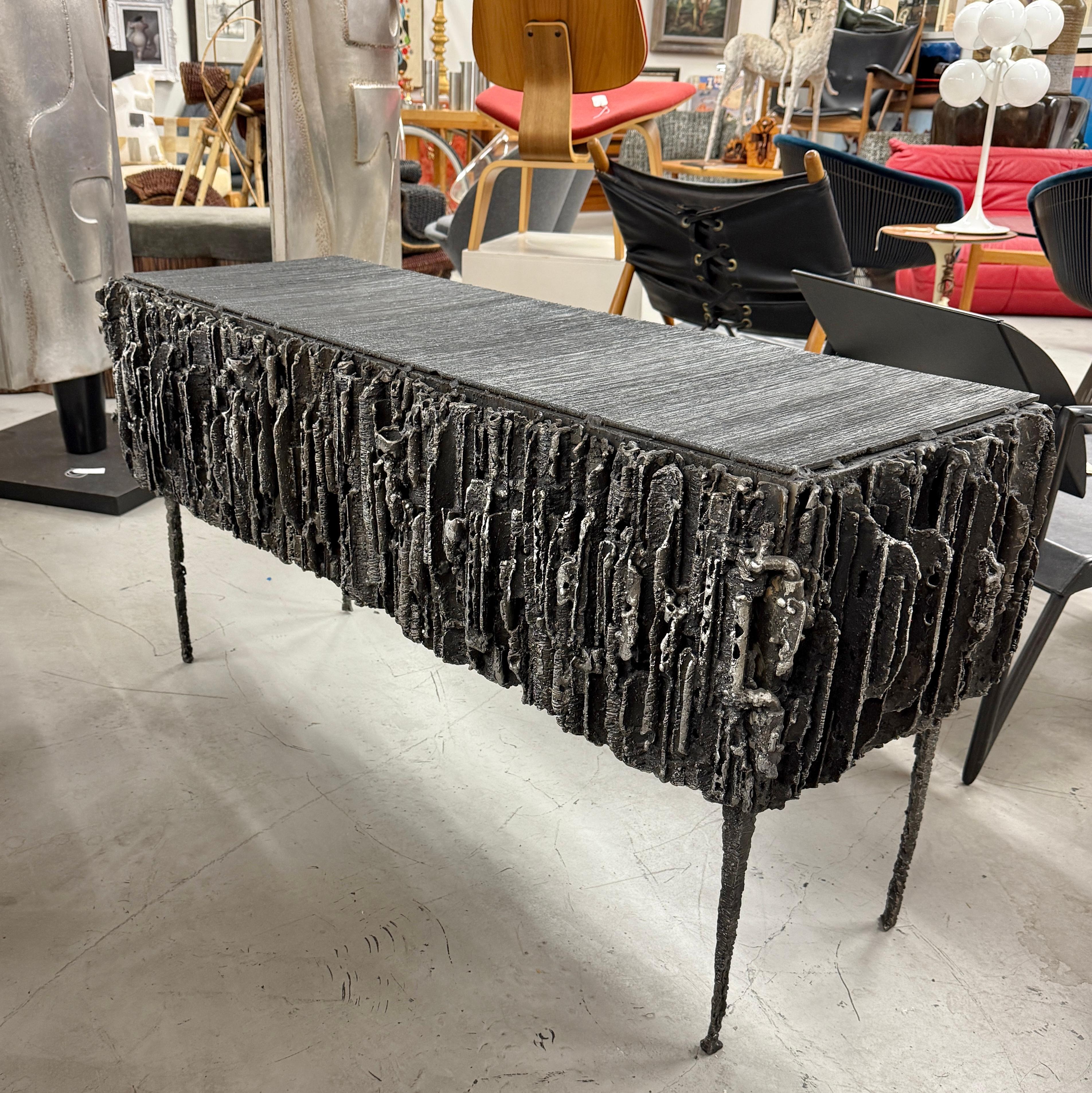 https://a.1stdibscdn.com/2021-james-bearden-brutalist-corinthian-cabinet-in-plasma-carved-steel-for-sale-picture-2/f_8350/f_464729721756588836501/IMG_5808_master.jpeg