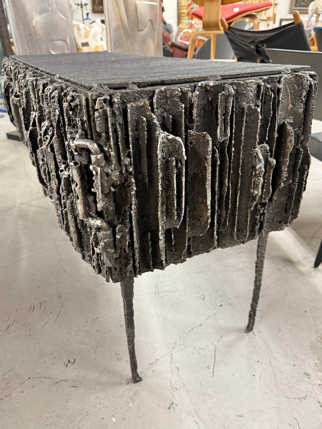 https://a.1stdibscdn.com/2021-james-bearden-brutalist-corinthian-cabinet-in-plasma-carved-steel-for-sale-picture-3/f_8350/f_464729721756588837101/IMG_5809_master.jpeg