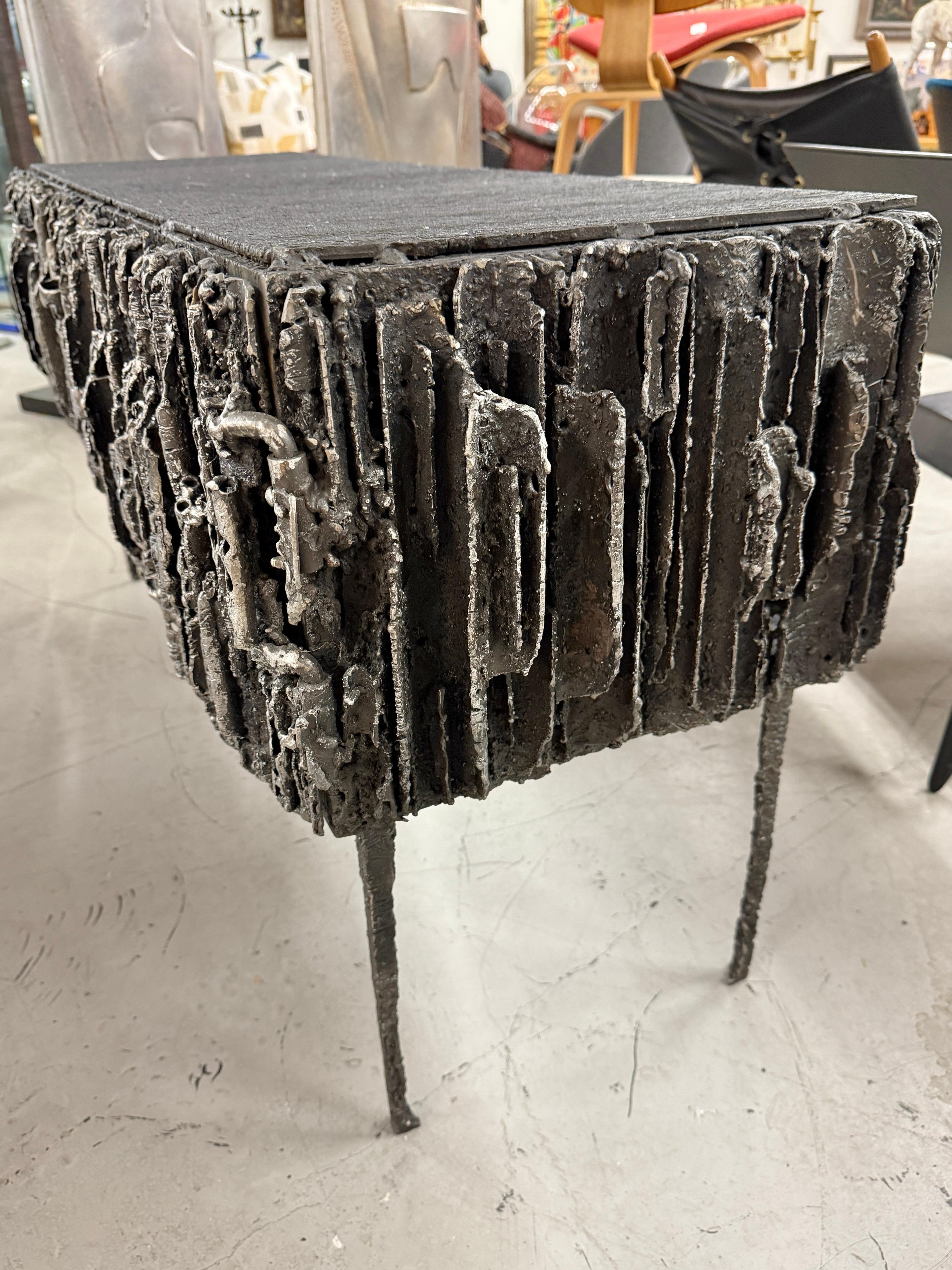 https://a.1stdibscdn.com/2021-james-bearden-brutalist-corinthian-cabinet-in-plasma-carved-steel-for-sale-picture-3/f_8350/f_464729721756588837101/IMG_5809_master.jpeg