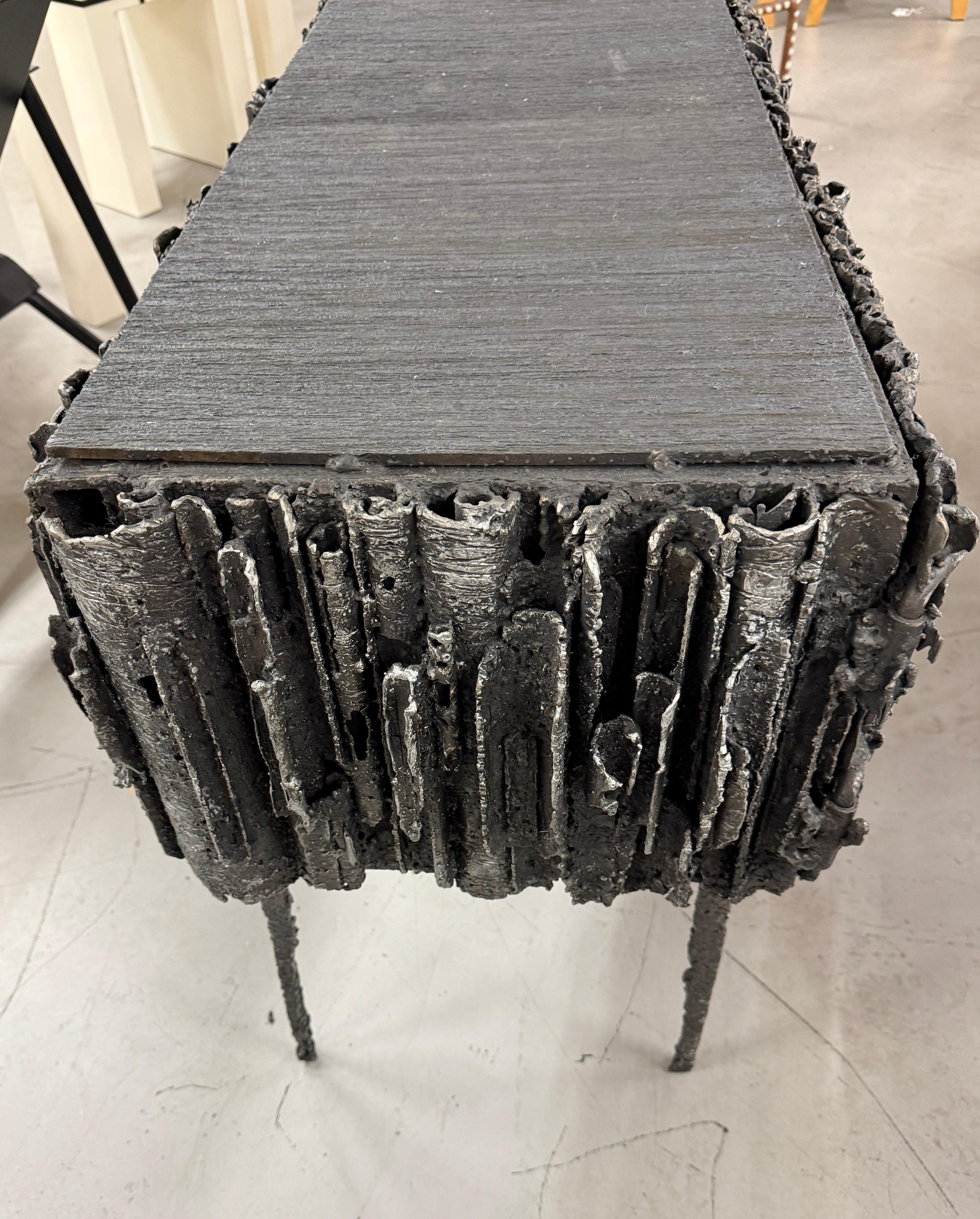 https://a.1stdibscdn.com/2021-james-bearden-brutalist-corinthian-cabinet-in-plasma-carved-steel-for-sale-picture-7/f_8350/f_464729721756588836762/IMG_5813_master.jpeg