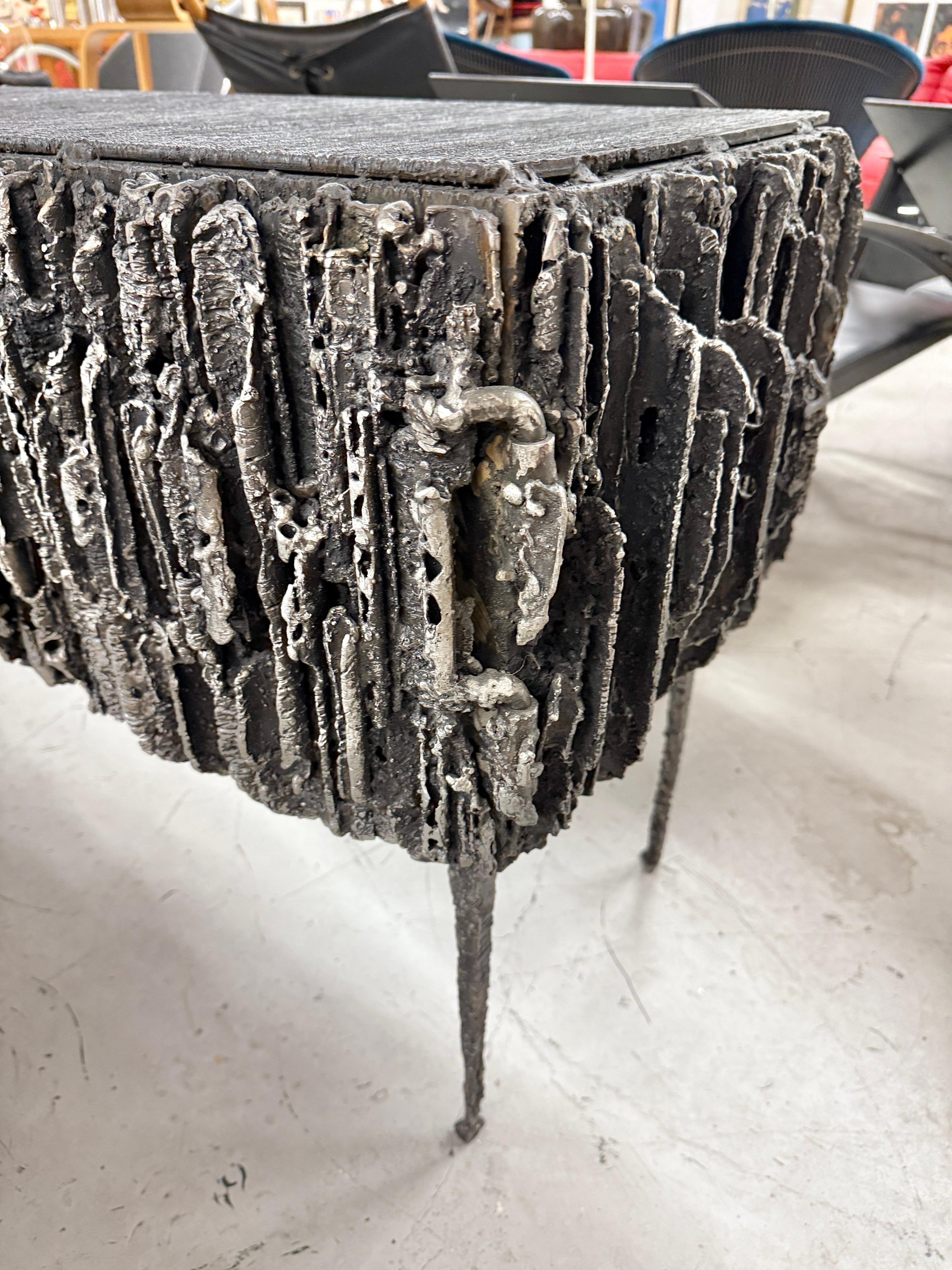 https://a.1stdibscdn.com/2021-james-bearden-brutalist-corinthian-cabinet-in-plasma-carved-steel-for-sale-picture-11/f_8350/f_464729721756588844933/IMG_5817_master.jpeg