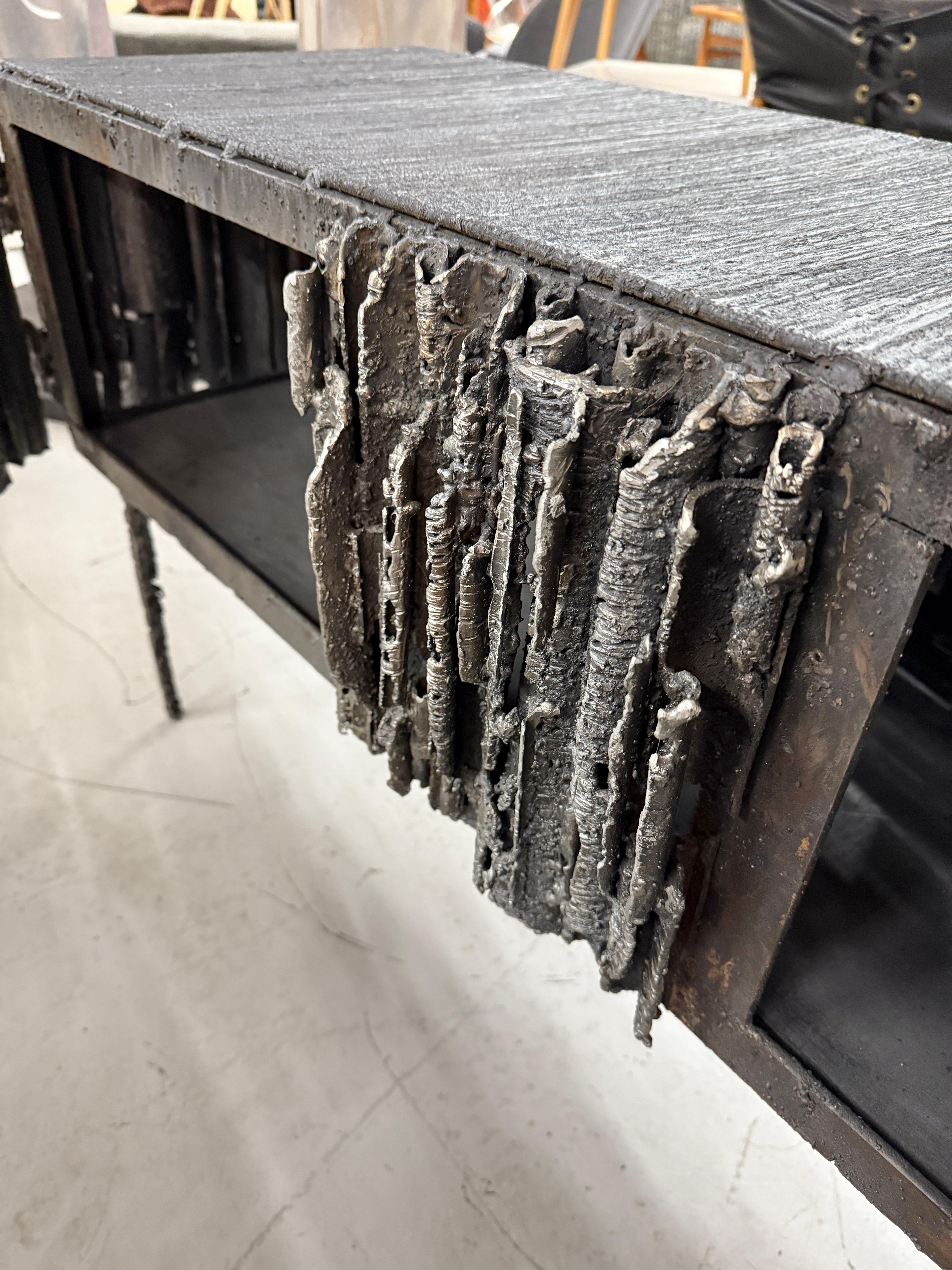 https://a.1stdibscdn.com/2021-james-bearden-brutalist-corinthian-cabinet-in-plasma-carved-steel-for-sale-picture-13/f_8350/f_464729721756588844874/IMG_5819_master.jpeg