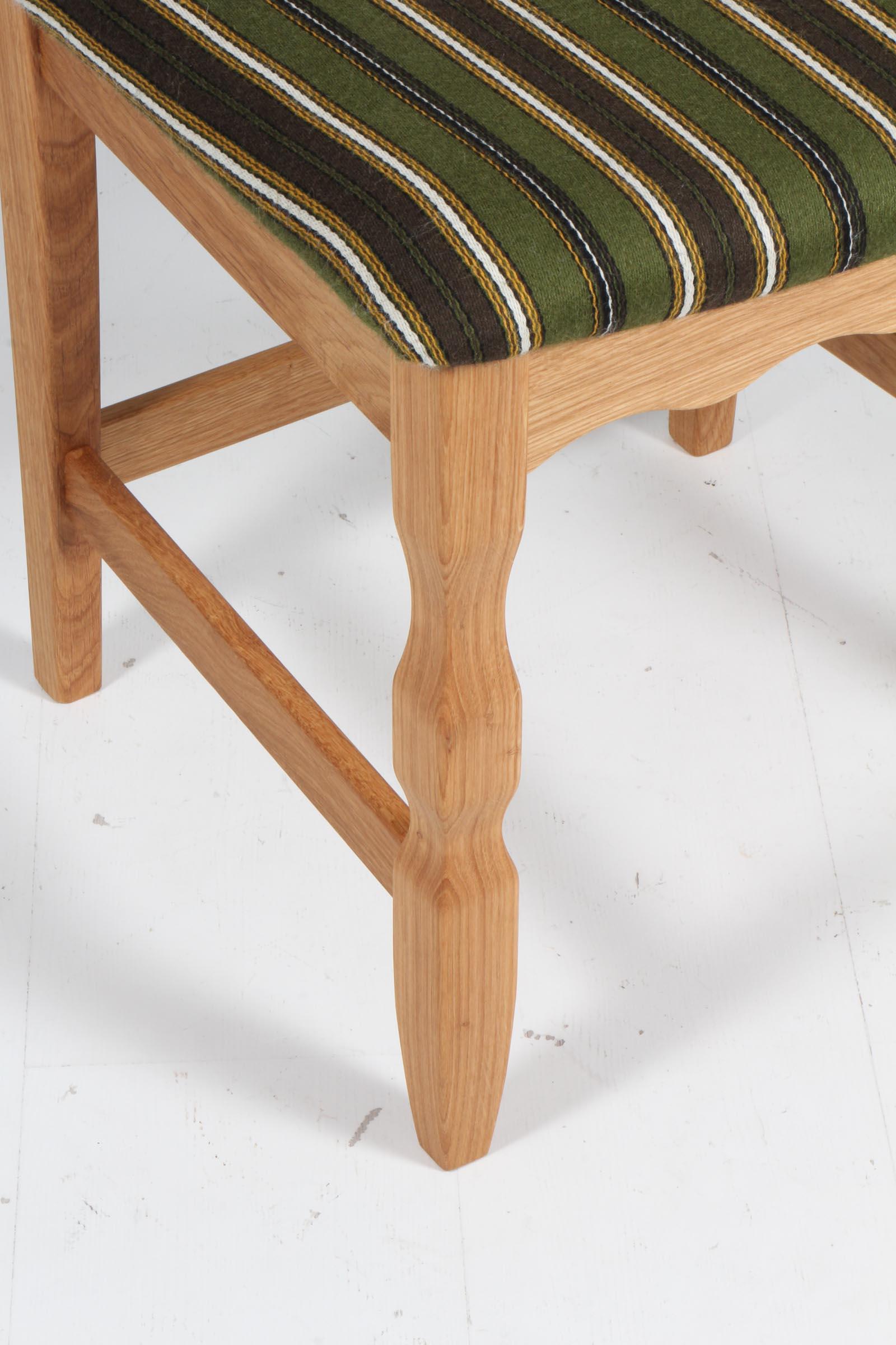 https://a.1stdibscdn.com/dining-chairs-by-henning-kjaernulf-model-razoblade-denmark-oak-for-sale-picture-4/f_42391/f_369029621698937102704/IMG_6081_master.jpg