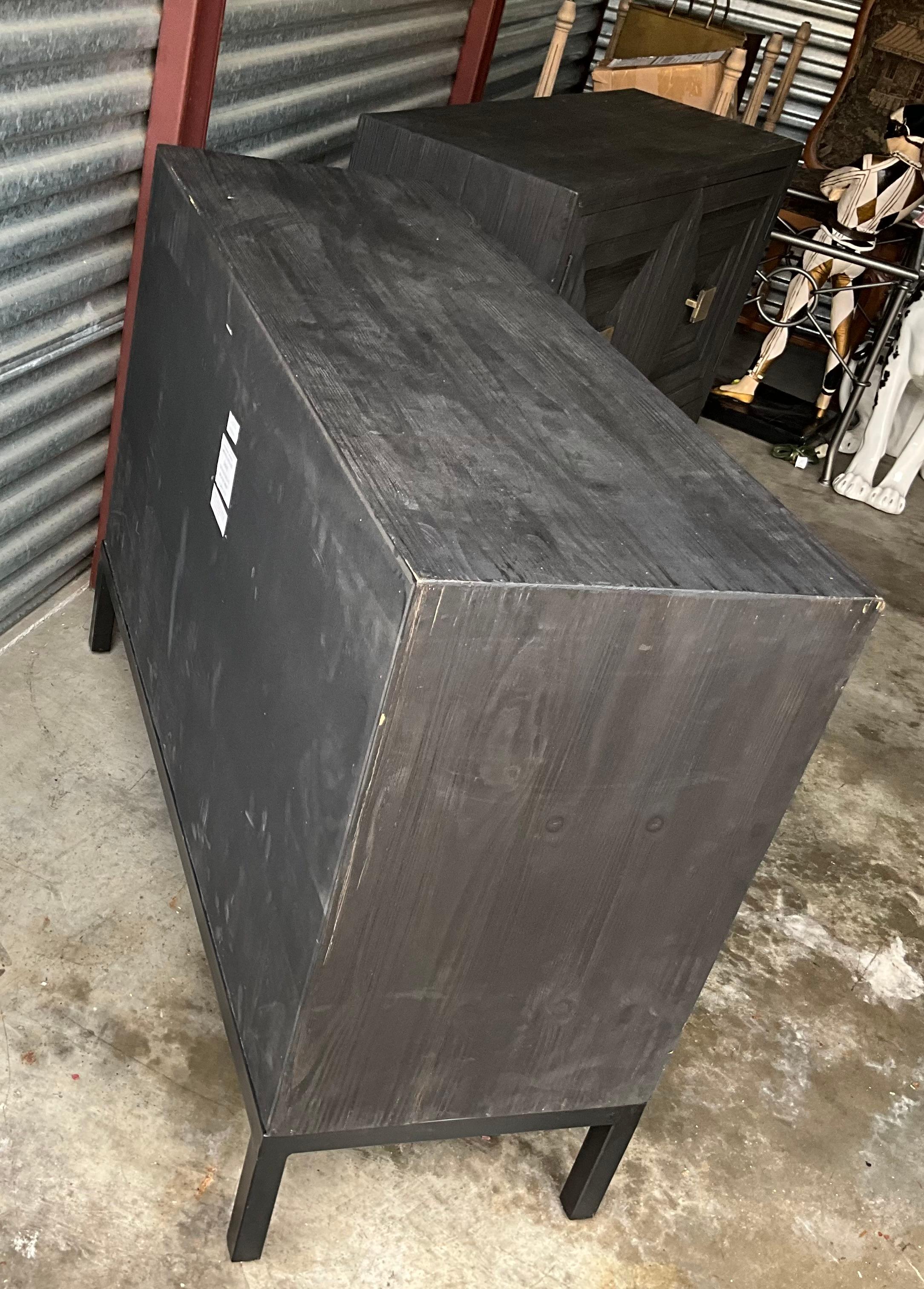 https://a.1stdibscdn.com/new-uttermost-organic-modern-distressed-black-and-gilt-cabinets-pair-for-sale-picture-3/f_54562/f_340233821682648289501/IMG_6149_master.jpeg