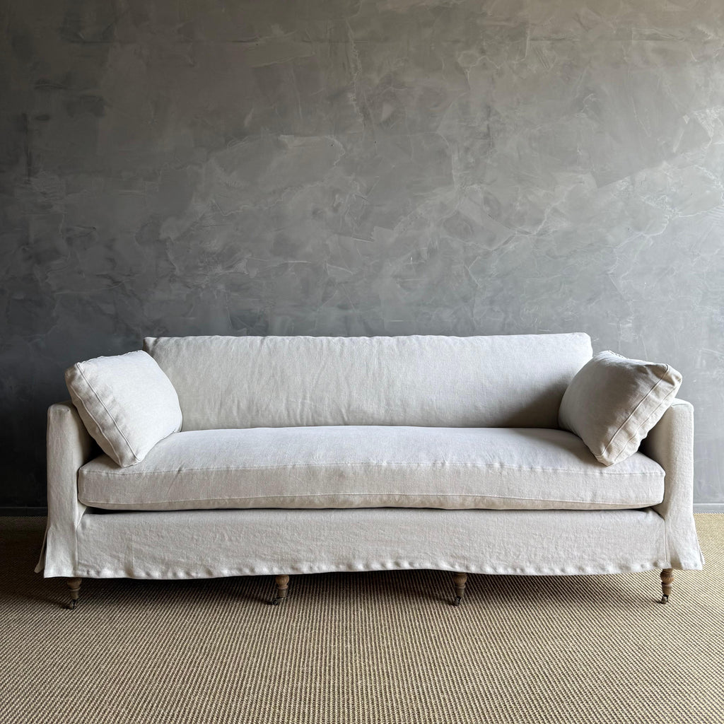 https://a.1stdibscdn.com/rudin-slip-covered-stone-washed-linen-sofa-with-down-cushions-for-sale-picture-3/f_18223/f_453499621749244461986/IMG_6325_master.jpg