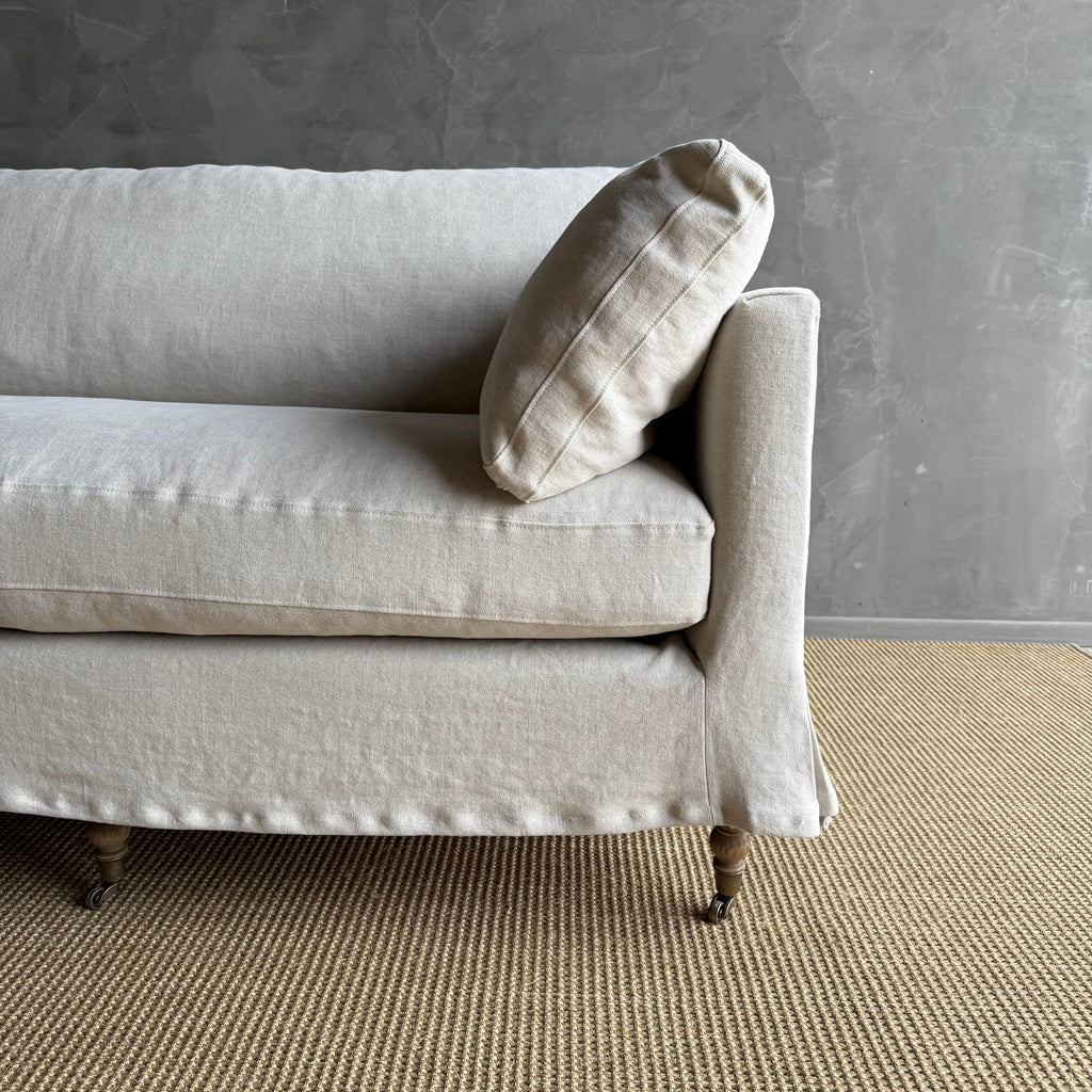 https://a.1stdibscdn.com/rudin-slip-covered-stone-washed-linen-sofa-with-down-cushions-for-sale-picture-4/f_18223/f_453499621749244463005/IMG_6326_master.jpg