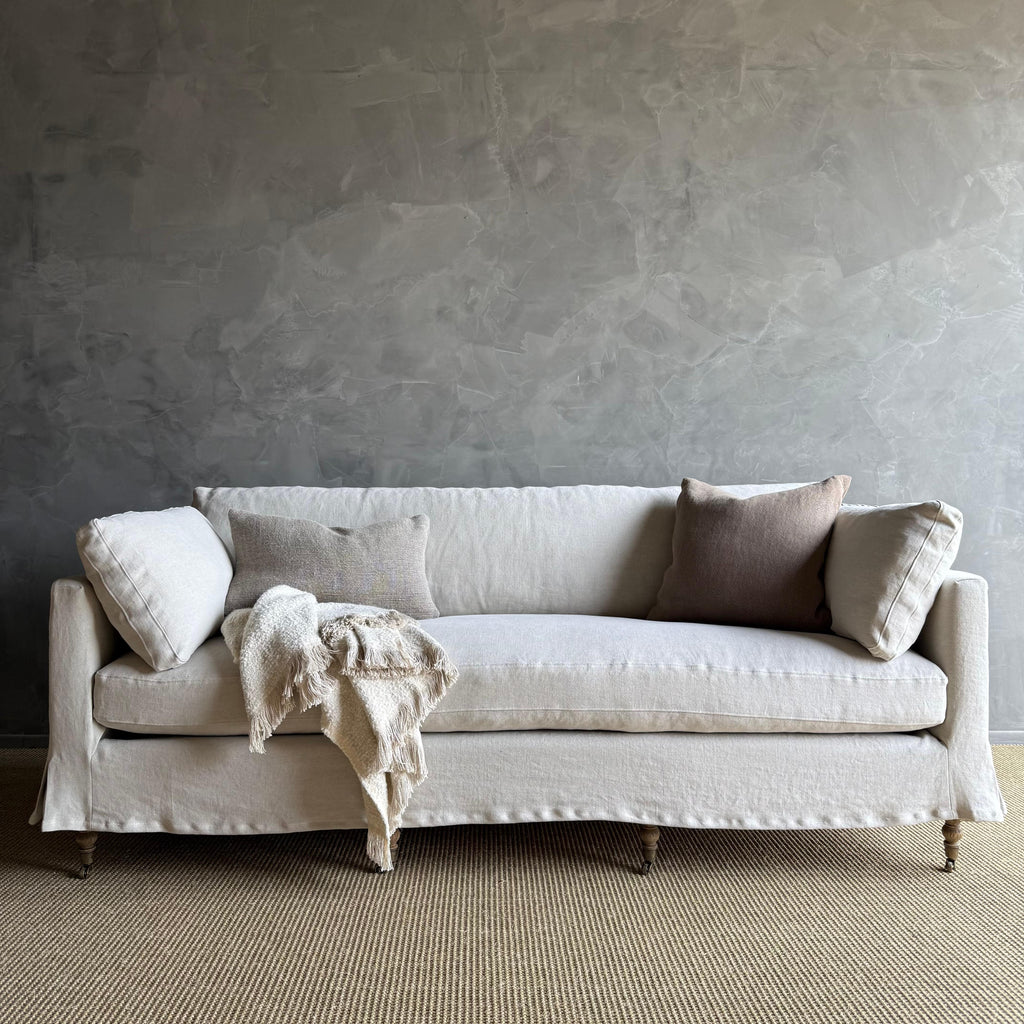 https://a.1stdibscdn.com/rudin-slip-covered-stone-washed-linen-sofa-with-down-cushions-for-sale-picture-2/f_18223/f_453499621749244462040/IMG_6329_master.jpg