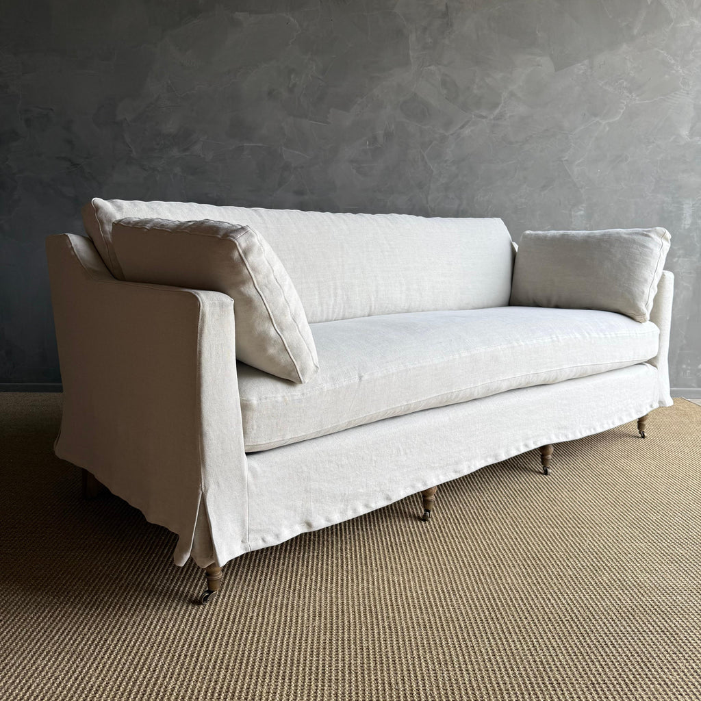 https://a.1stdibscdn.com/rudin-slip-covered-stone-washed-linen-sofa-with-down-cushions-for-sale-picture-8/f_18223/f_453499621749244462342/IMG_6331_master.jpg