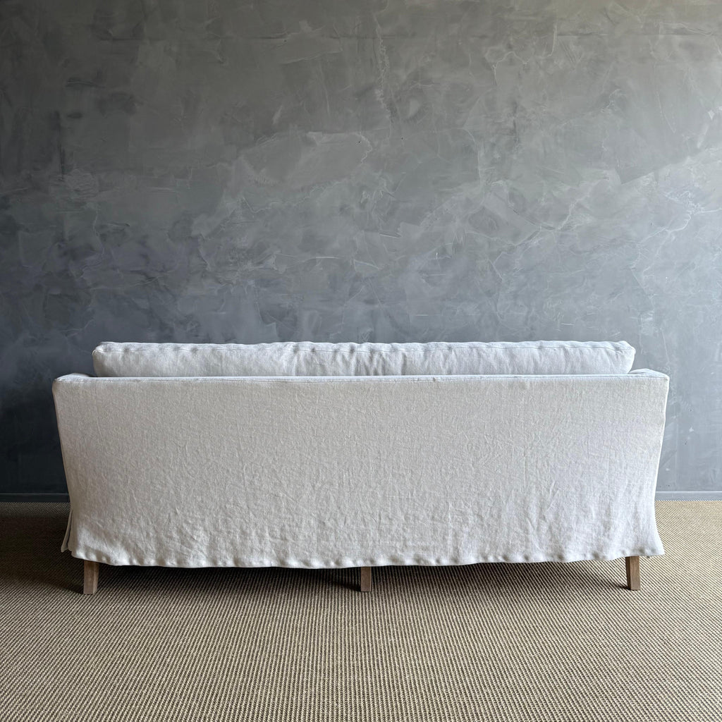 https://a.1stdibscdn.com/rudin-slip-covered-stone-washed-linen-sofa-with-down-cushions-for-sale-picture-10/f_18223/f_453499621749244466059/IMG_6333_master.jpg