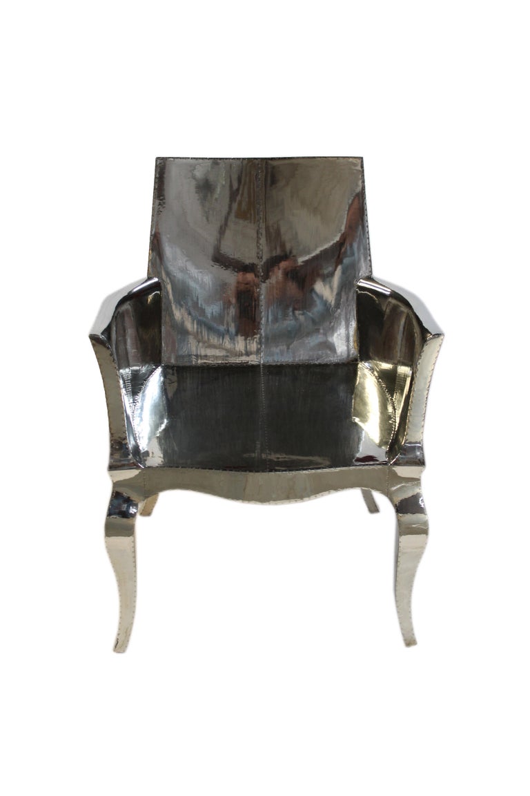 https://a.1stdibscdn.com/louis-xvi-chair-in-white-bronze-metal-clad-over-teak-club-chair-by-p-mathieu-for-sale-picture-14/f_42361/f_318031221671403659957/IMG_6696_master.JPG?width=768