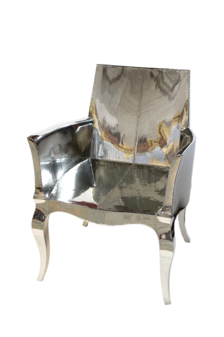 https://a.1stdibscdn.com/louis-xvi-chair-in-white-bronze-metal-clad-over-teak-club-chair-by-p-mathieu-for-sale-picture-15/f_42361/f_318031221671403660682/IMG_6697_master.JPG?width=768
