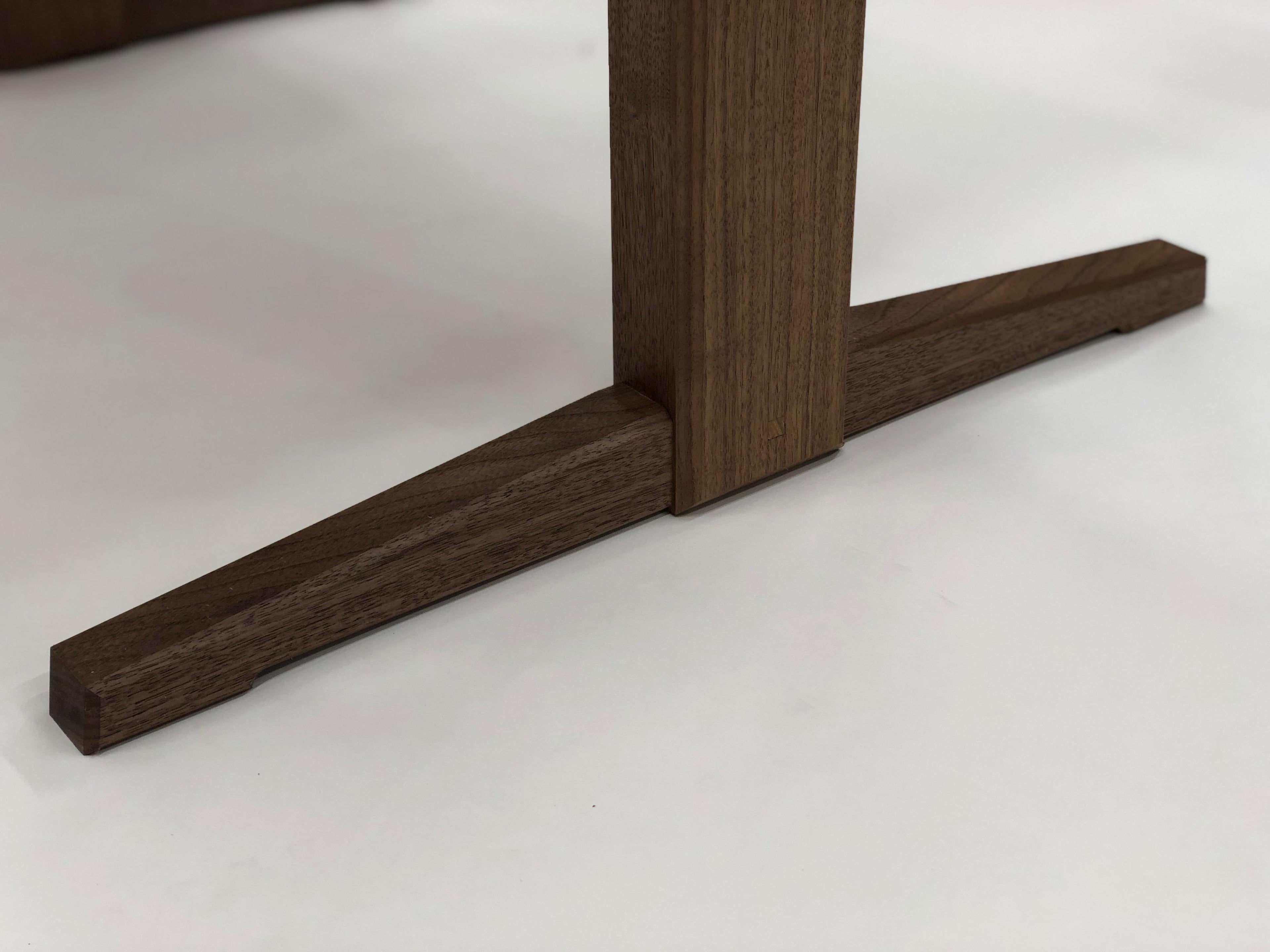 https://a.1stdibscdn.com/trestle-base-dining-table-in-quartersawn-walnut-by-brian-holcombe-for-sale-picture-5/f_45782/f_201312621596812495086/IMG_6724_master.jpeg