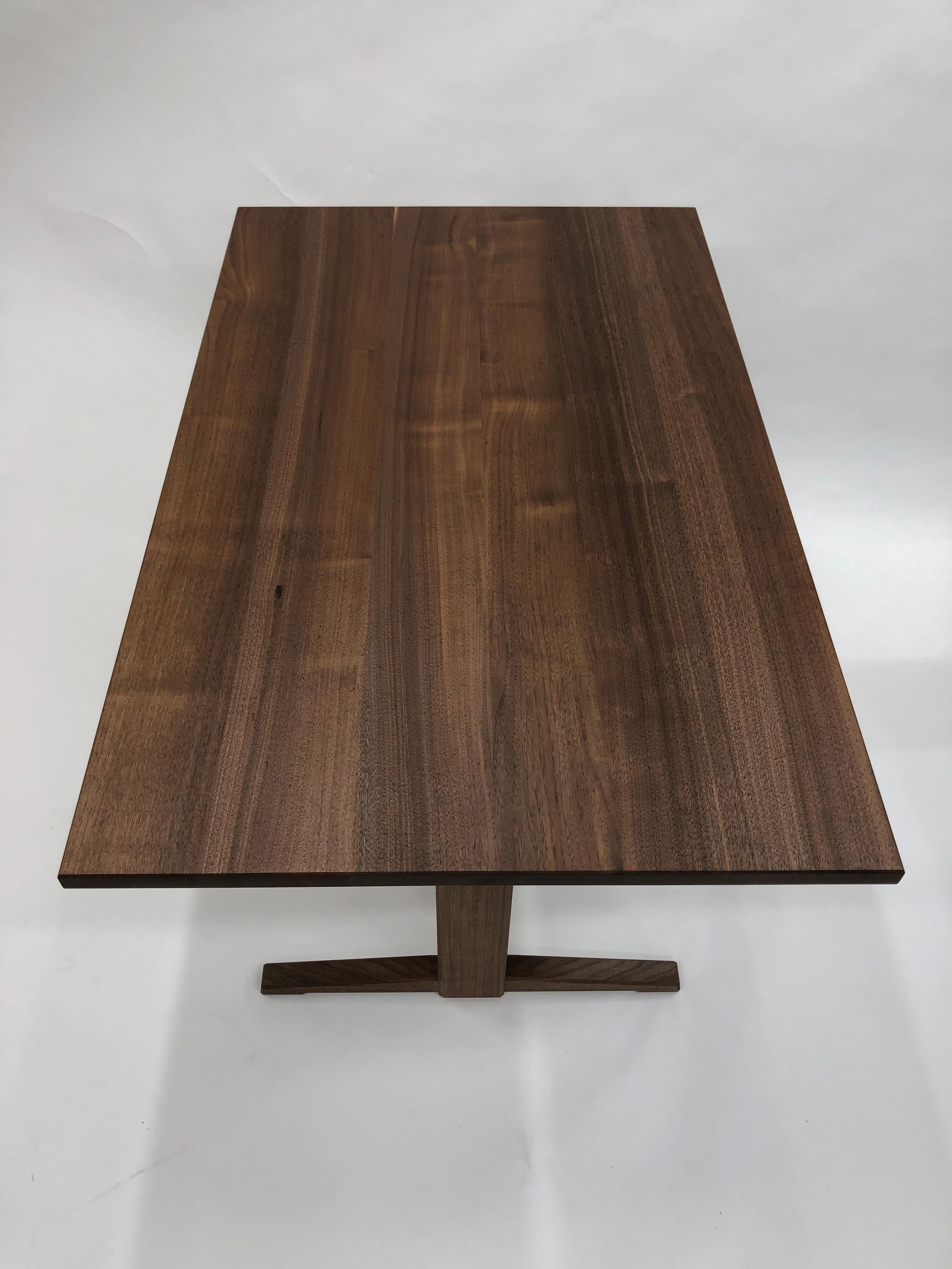 https://a.1stdibscdn.com/trestle-base-dining-table-in-quartersawn-walnut-by-brian-holcombe-for-sale-picture-2/f_45782/f_201312621596812472847/IMG_6735_master.jpeg