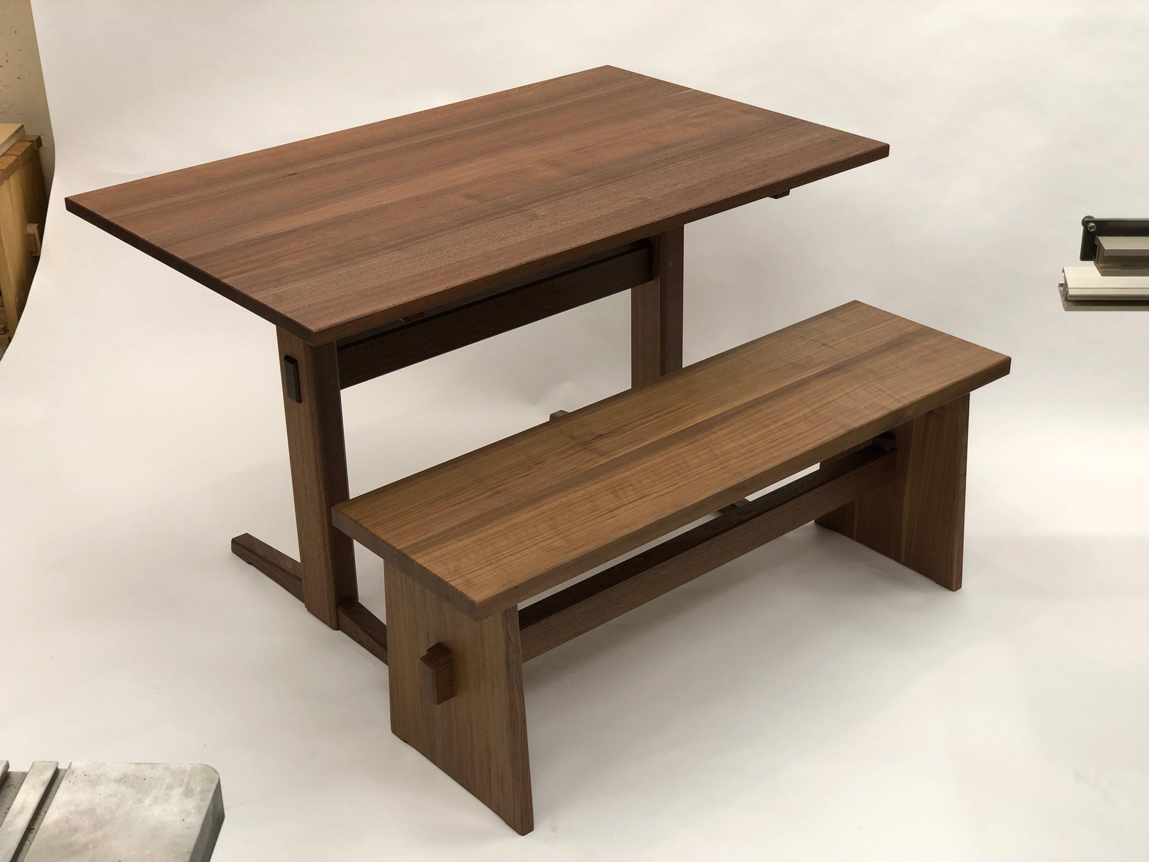 https://a.1stdibscdn.com/trestle-base-dining-table-in-quartersawn-walnut-by-brian-holcombe-for-sale-picture-6/f_45782/f_201312621596812536076/IMG_6747_master.jpeg