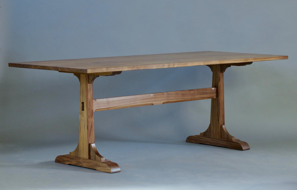 https://a.1stdibscdn.com/walnut-trestle-dining-table-by-thomas-throop-black-creek-designs-made-to-order-for-sale-picture-2/f_69132/f_457722921751920582523/IMG_7225_master.jpg