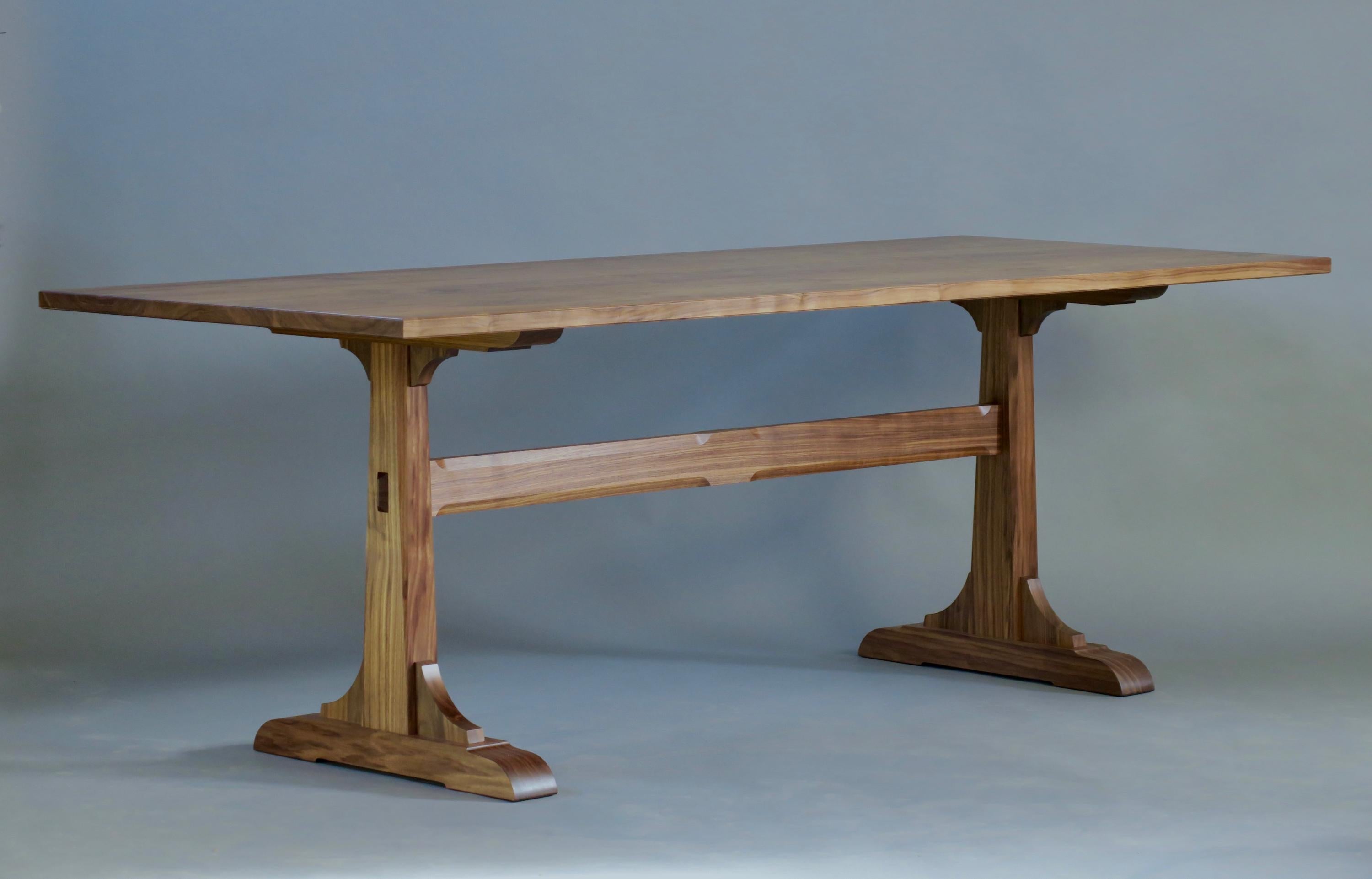 https://a.1stdibscdn.com/walnut-trestle-dining-table-by-thomas-throop-black-creek-designs-made-to-order-for-sale-picture-2/f_69132/f_457722921751920582523/IMG_7225_master.jpg