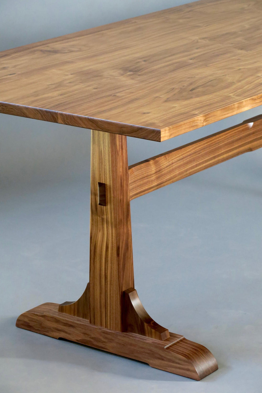 https://a.1stdibscdn.com/walnut-trestle-dining-table-by-thomas-throop-black-creek-designs-made-to-order-for-sale-picture-3/f_69132/f_457722921751920583264/IMG_7307_master.jpg