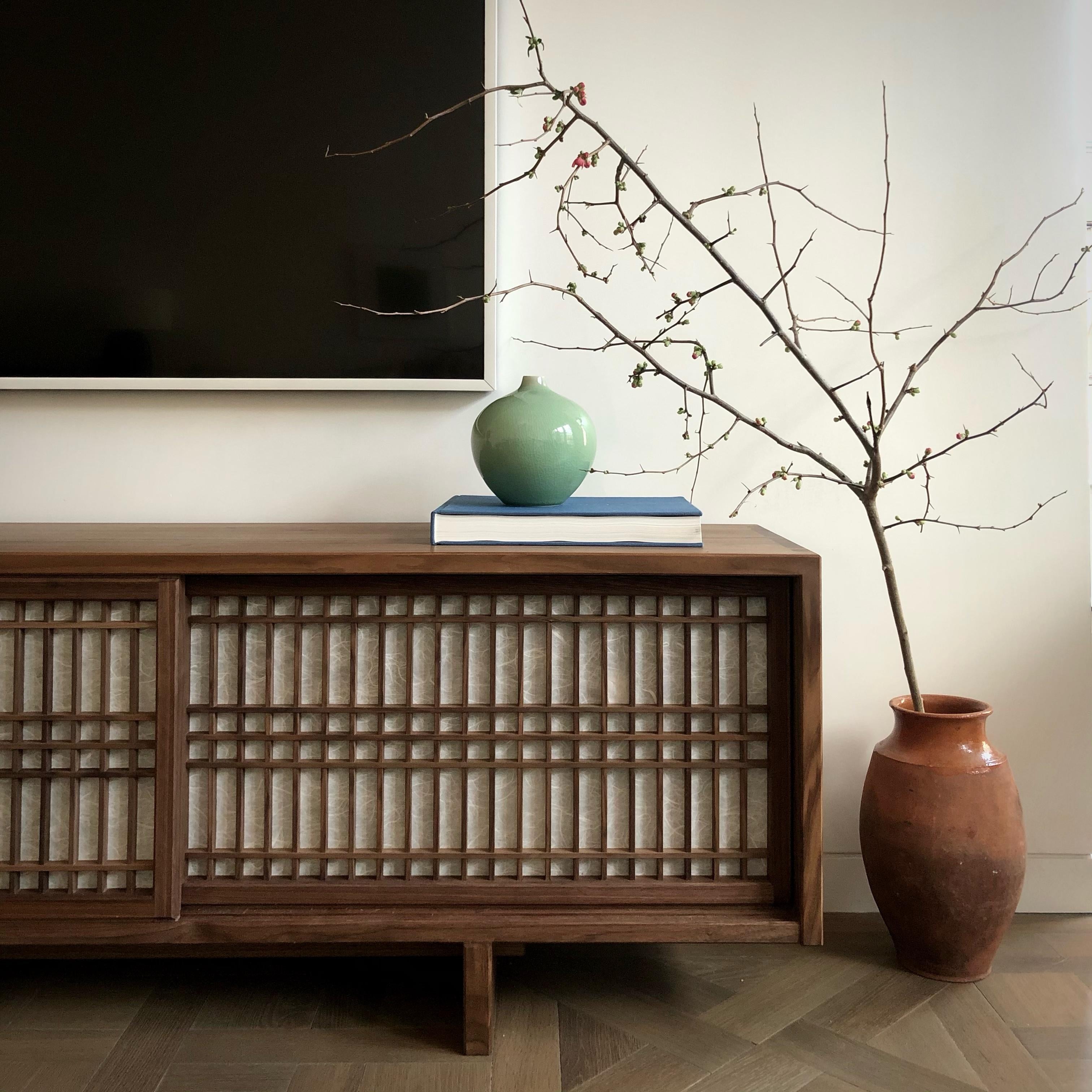 https://a.1stdibscdn.com/walnut-media-console-room-divider-with-sliding-shoji-doors-for-sale-picture-3/f_45782/f_227077621625492100772/IMG_7620_master.jpg