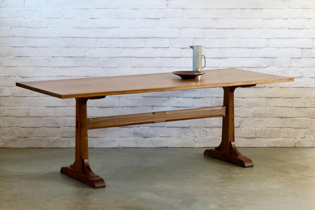 https://a.1stdibscdn.com/walnut-trestle-dining-table-by-thomas-throop-black-creek-designs-made-to-order-for-sale-picture-5/f_69132/f_457722921751920584711/IMG_7671_1__master.jpg