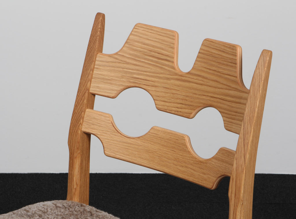 https://a.1stdibscdn.com/dining-chairs-by-henning-kjaernulf-model-razoblade-denmark-oak-for-sale-picture-3/f_42391/f_483738621768671407185/IMG_7752_master.jpg