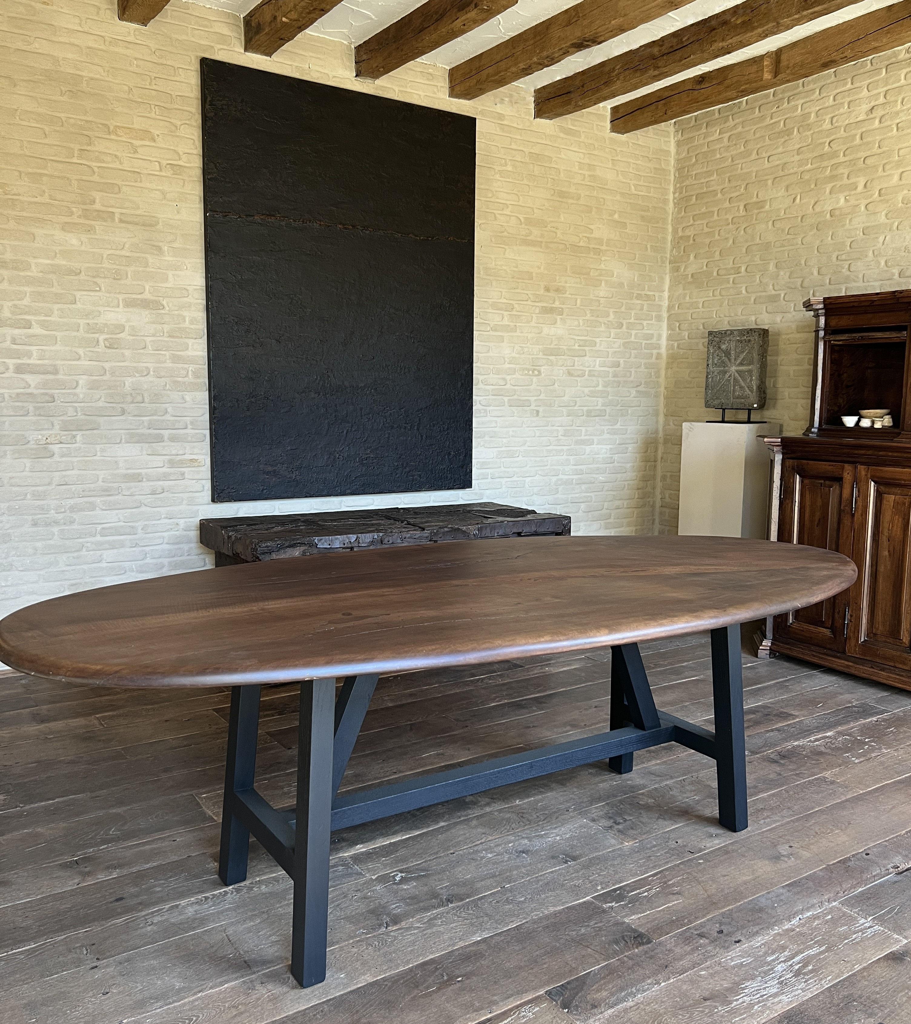 https://a.1stdibscdn.com/custom-walnut-2-plank-top-oval-dining-table-model-lusi-dark-finish-for-sale-picture-2/f_20233/f_470116321760212937629/IMG_7775_master.JPG