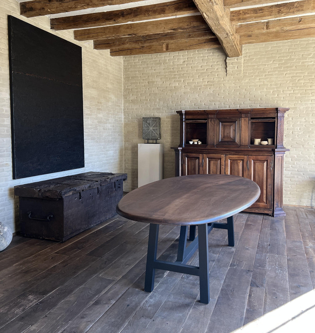 https://a.1stdibscdn.com/custom-walnut-2-plank-top-oval-dining-table-model-lusi-dark-finish-for-sale-picture-3/f_20233/f_470116321760212937520/IMG_7777_master.JPG