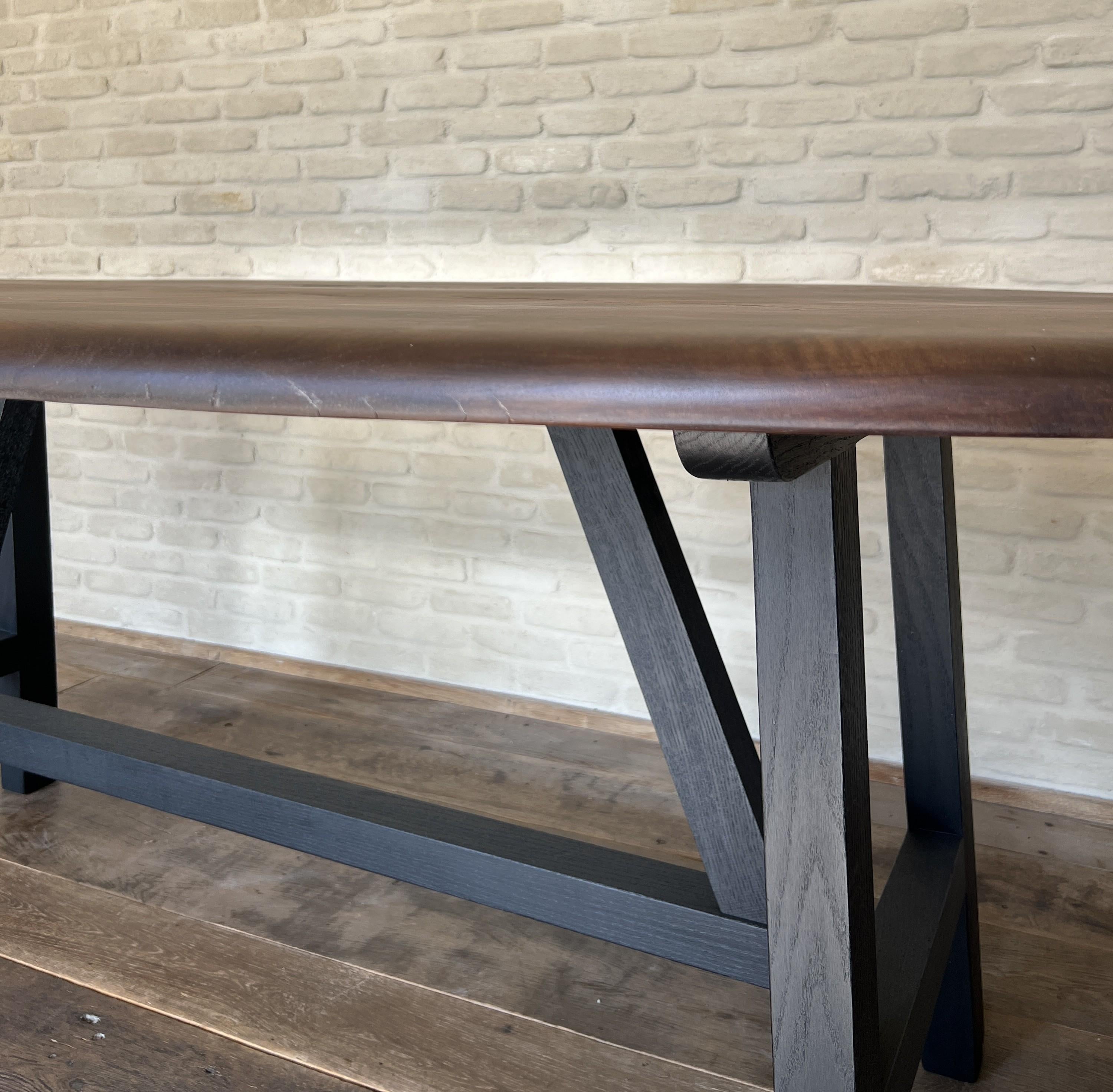 https://a.1stdibscdn.com/custom-walnut-2-plank-top-oval-dining-table-model-lusi-dark-finish-for-sale-picture-8/f_20233/f_470116321760212941680/IMG_7801_master.JPG