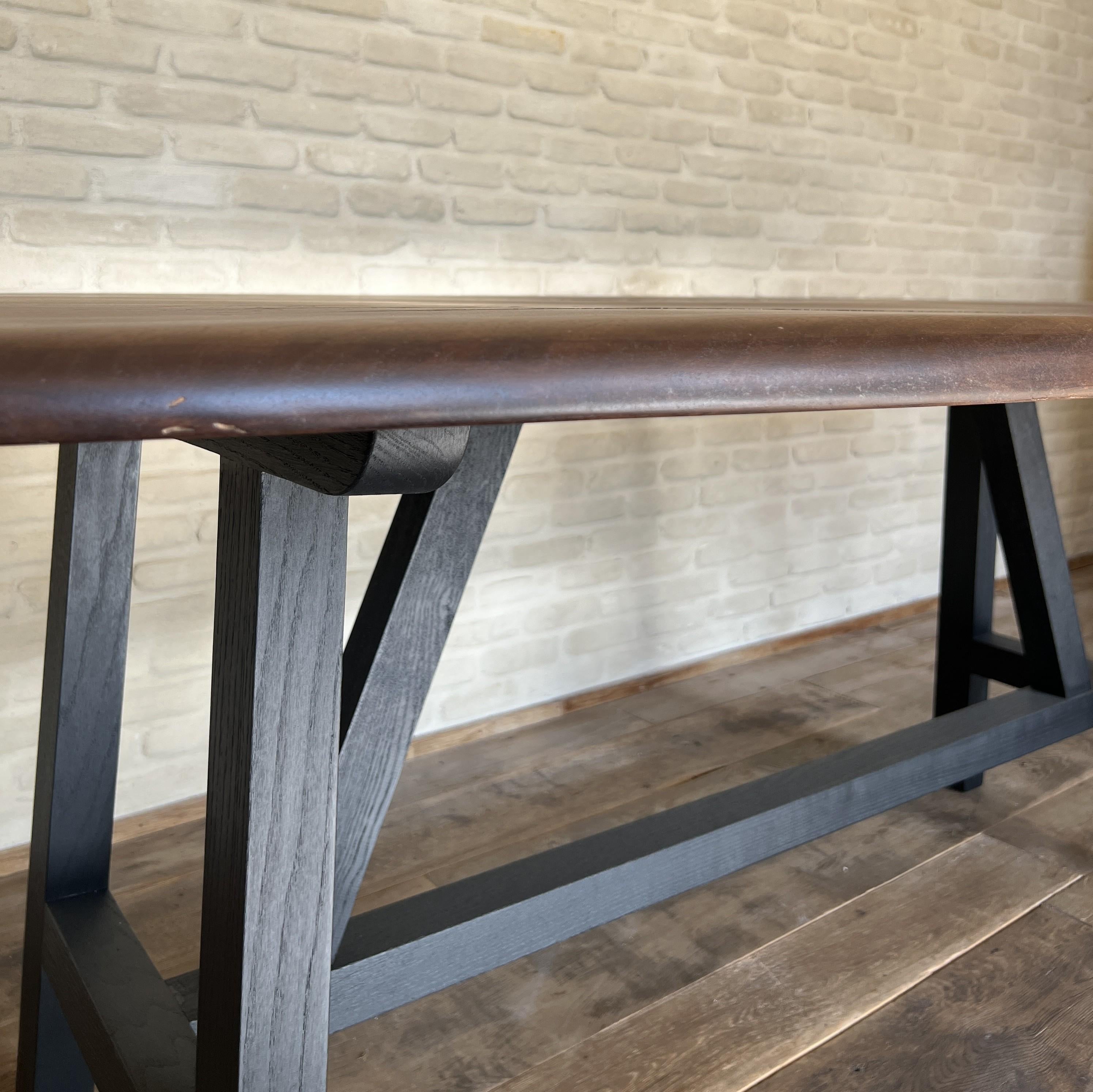 https://a.1stdibscdn.com/custom-walnut-2-plank-top-oval-dining-table-model-lusi-dark-finish-for-sale-picture-9/f_20233/f_470116321760212941517/IMG_7802_master.JPG