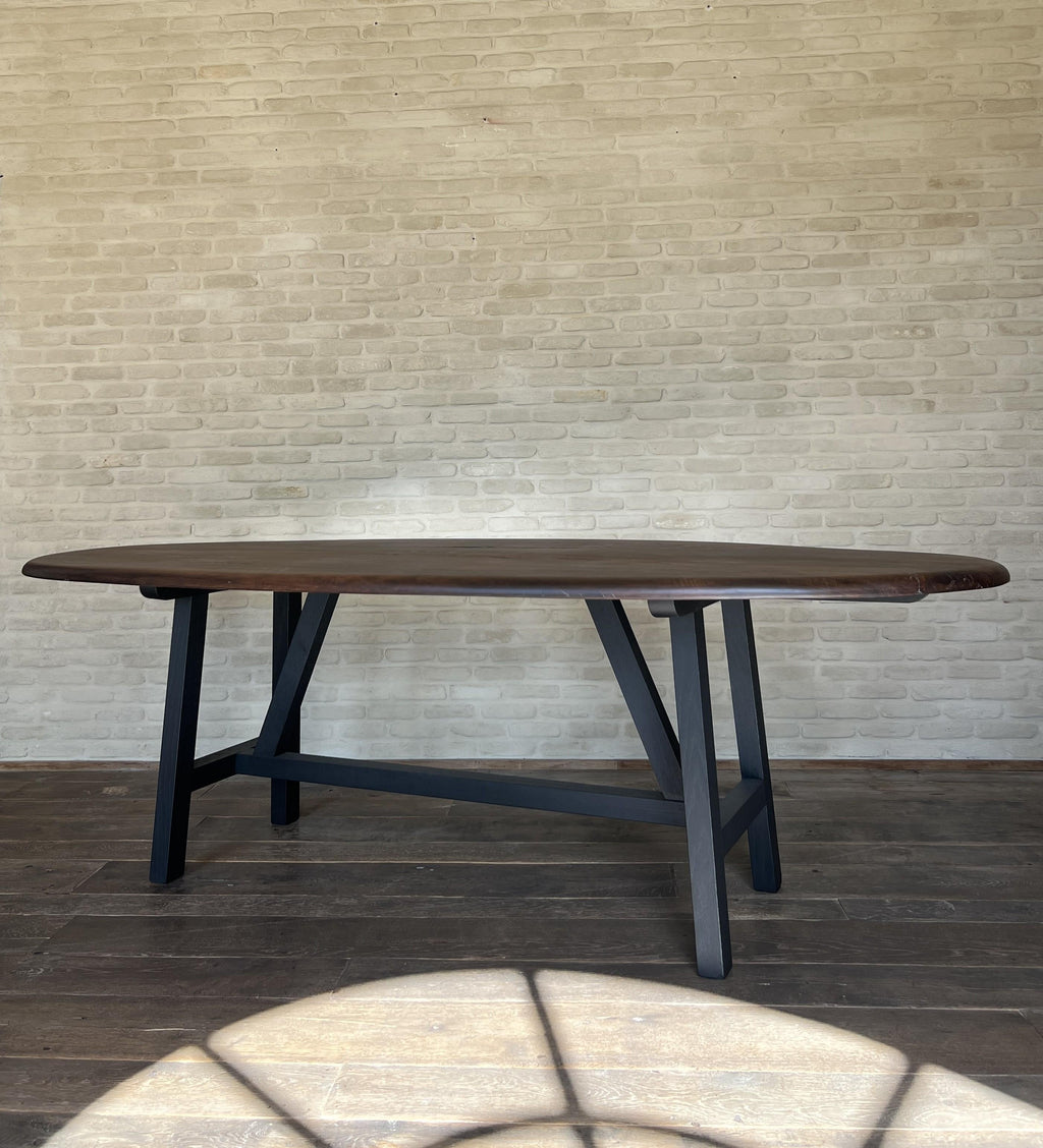 https://a.1stdibscdn.com/custom-walnut-2-plank-top-oval-dining-table-model-lusi-dark-finish-for-sale-picture-10/f_20233/f_470116321760212941652/IMG_7804_master.JPG