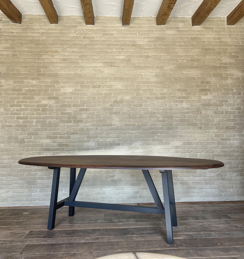 https://a.1stdibscdn.com/custom-walnut-2-plank-top-oval-dining-table-model-lusi-dark-finish-for-sale-picture-12/f_20233/f_470116321760212941934/IMG_7806_master.JPG