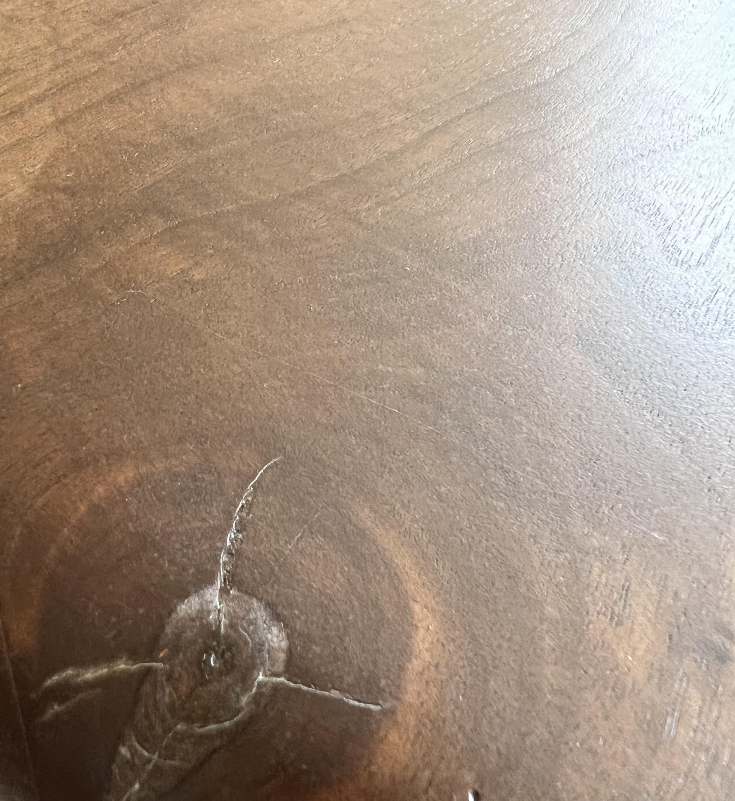 https://a.1stdibscdn.com/custom-walnut-2-plank-top-oval-dining-table-model-lusi-dark-finish-for-sale-picture-13/f_20233/f_470116321760212941166/IMG_7811_master.JPG