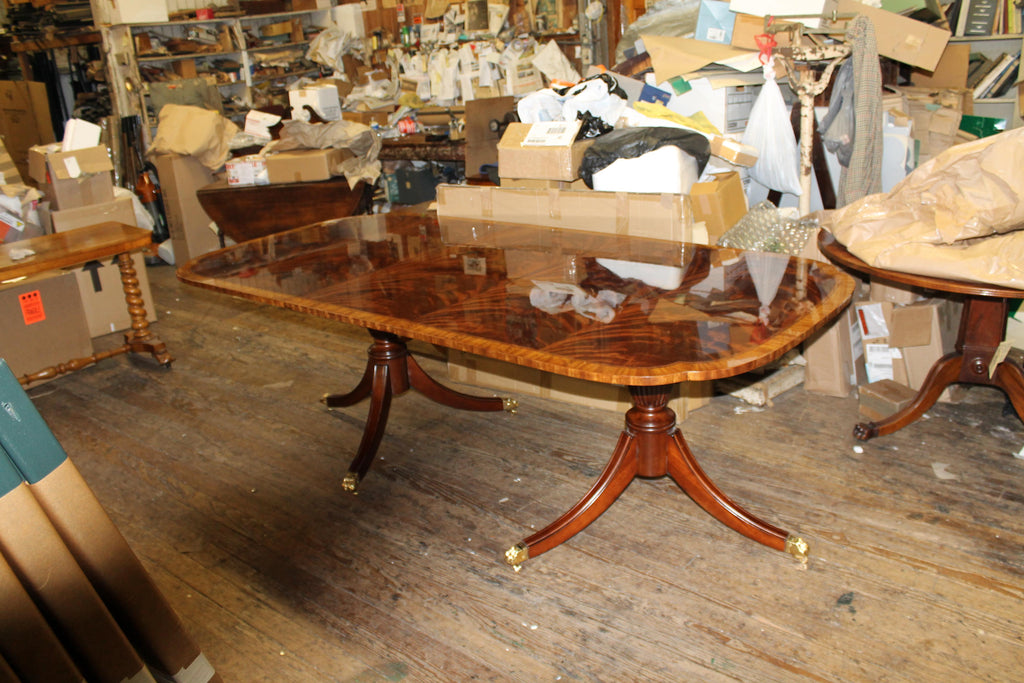 https://a.1stdibscdn.com/bench-made-reprod-inlaid-flame-mahogany-sheraton-style-three-leaf-dining-table-for-sale-picture-2/f_18913/f_251442021630533042112/IMG_8593_master.JPG