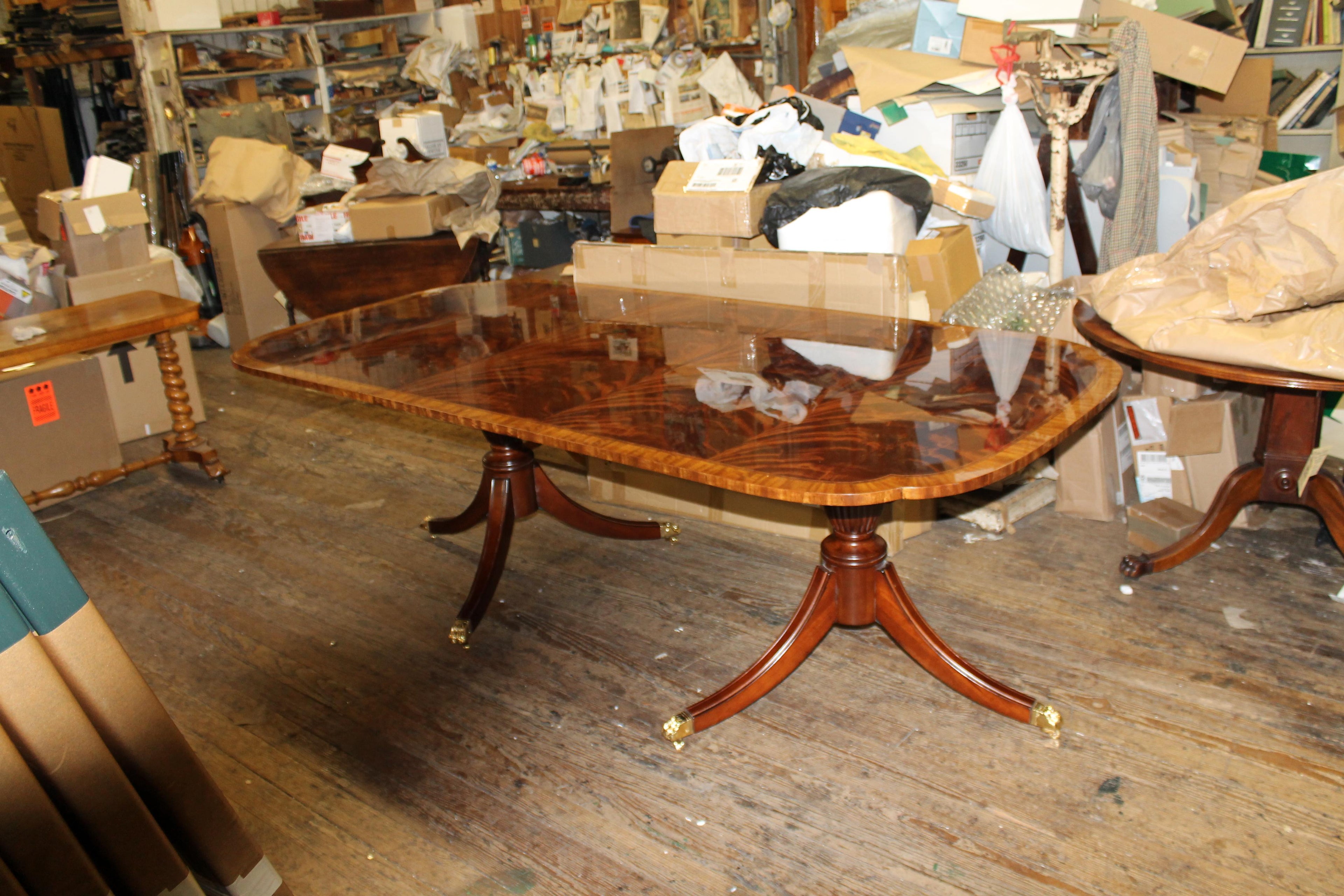 https://a.1stdibscdn.com/bench-made-reprod-inlaid-flame-mahogany-sheraton-style-three-leaf-dining-table-for-sale-picture-2/f_18913/f_251442021630533042112/IMG_8593_master.JPG