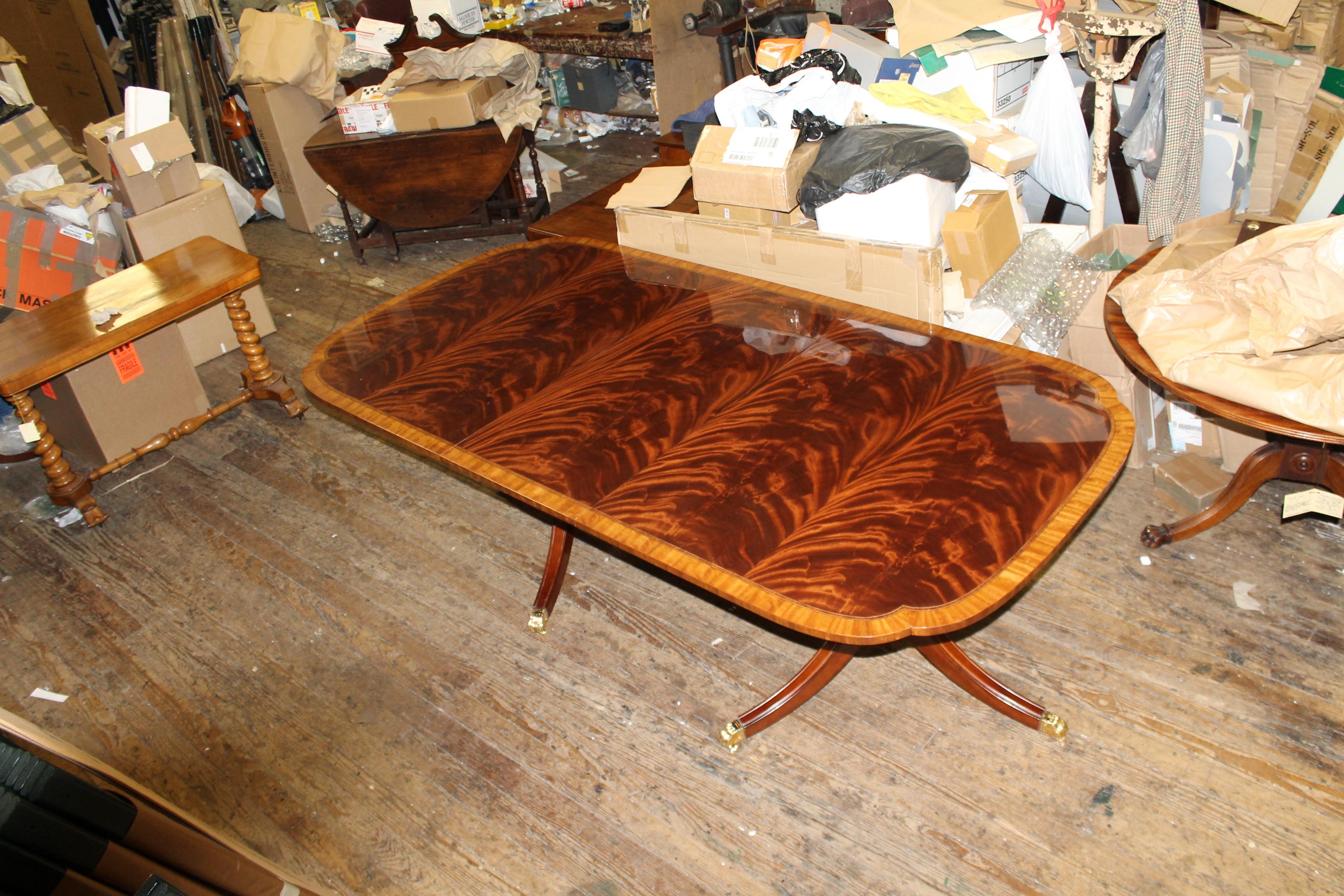 https://a.1stdibscdn.com/bench-made-reprod-inlaid-flame-mahogany-sheraton-style-three-leaf-dining-table-for-sale-picture-3/f_18913/f_251442021630533042654/IMG_8594_master.JPG