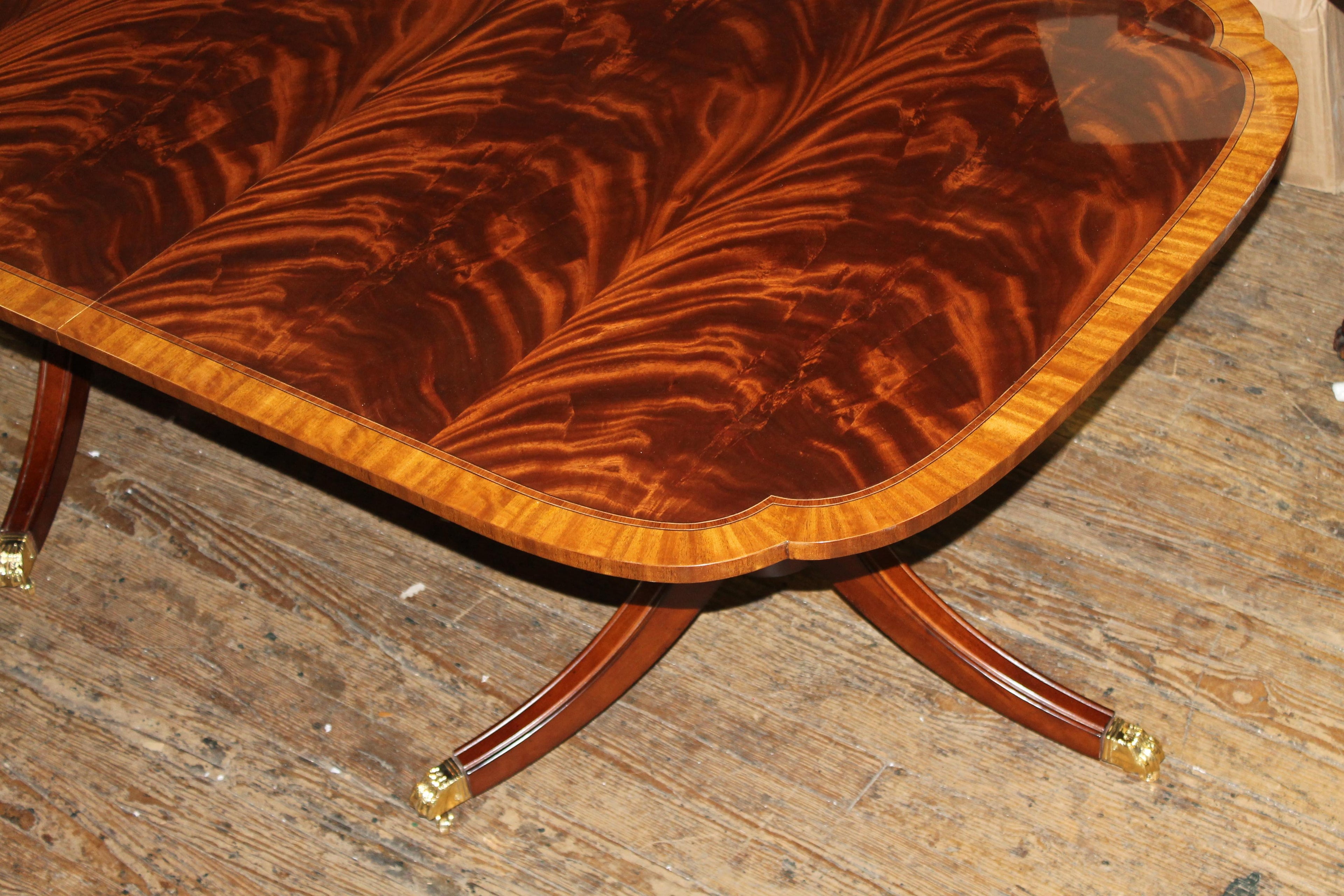 https://a.1stdibscdn.com/bench-made-reprod-inlaid-flame-mahogany-sheraton-style-three-leaf-dining-table-for-sale-picture-4/f_18913/f_251442021630533043291/IMG_8595_master.JPG