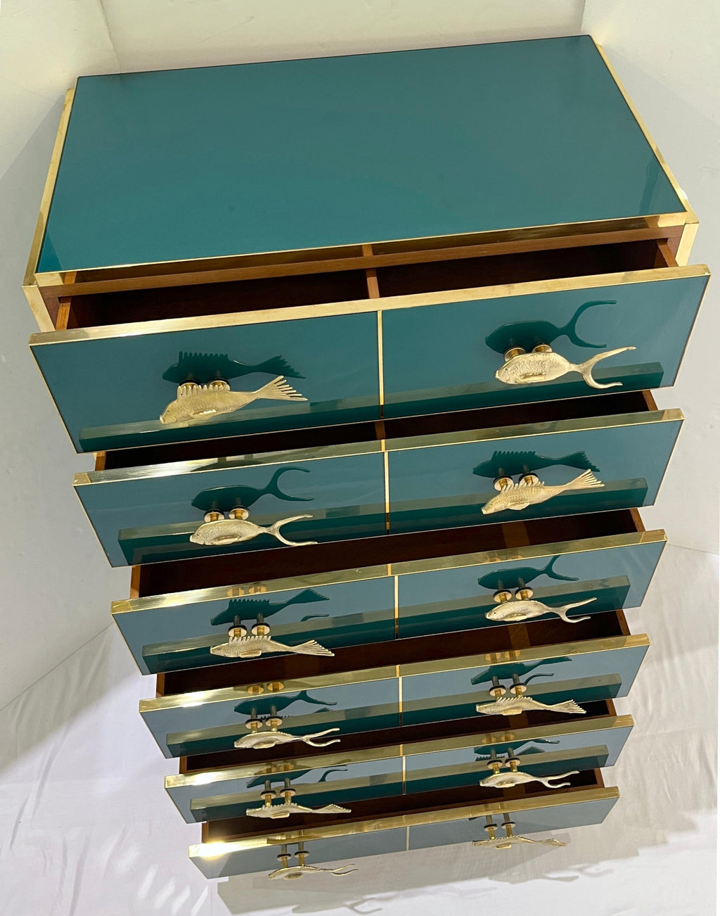 https://a.1stdibscdn.com/bespoke-italian-brass-emerald-blue-green-art-glass-6-drawer-highboy-dresser-for-sale-picture-10/f_54472/f_454558721749906444704/IMG_8972_1_master.jpg