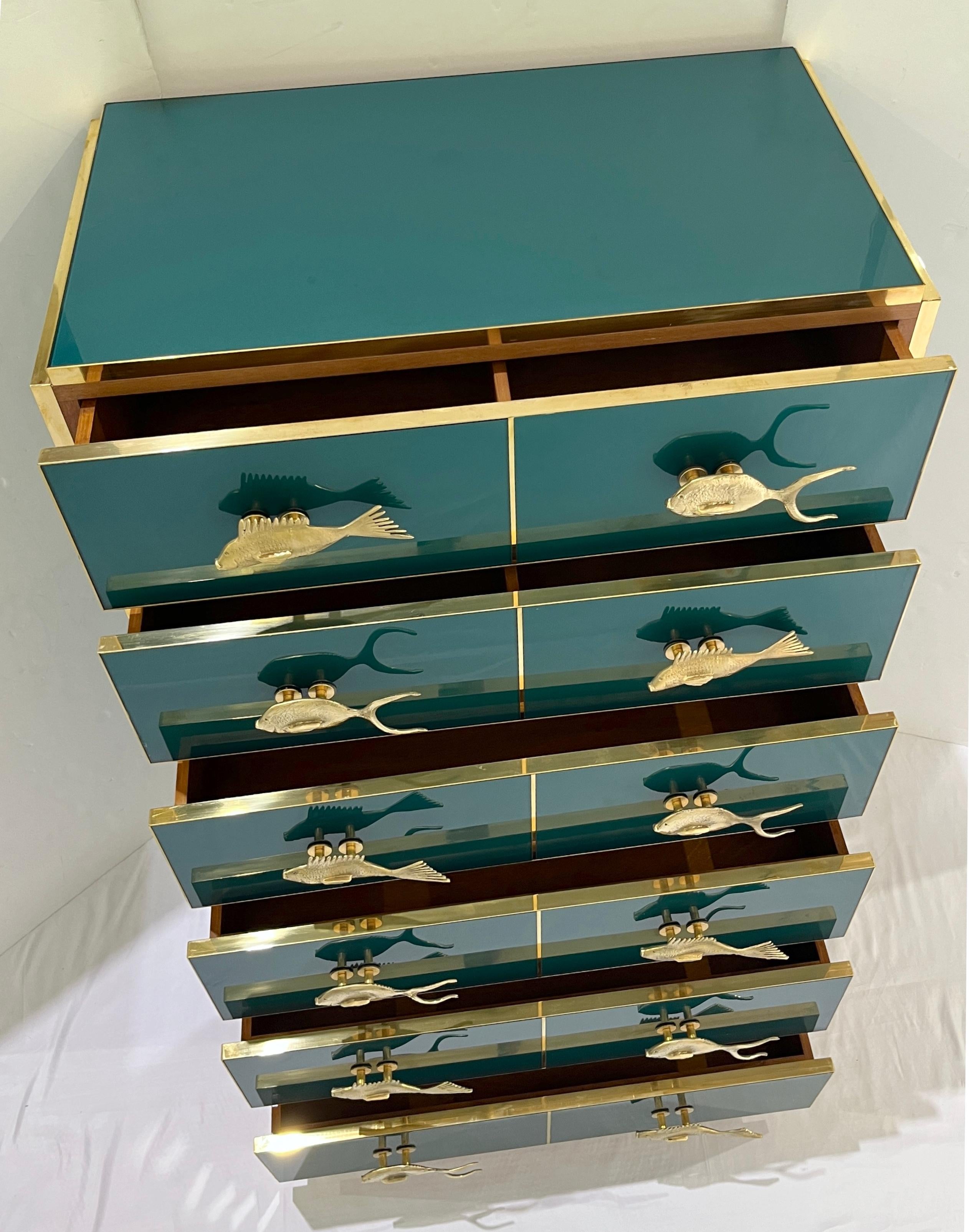 https://a.1stdibscdn.com/bespoke-italian-brass-emerald-blue-green-art-glass-6-drawer-highboy-dresser-for-sale-picture-10/f_54472/f_454558721749906444704/IMG_8972_1_master.jpg