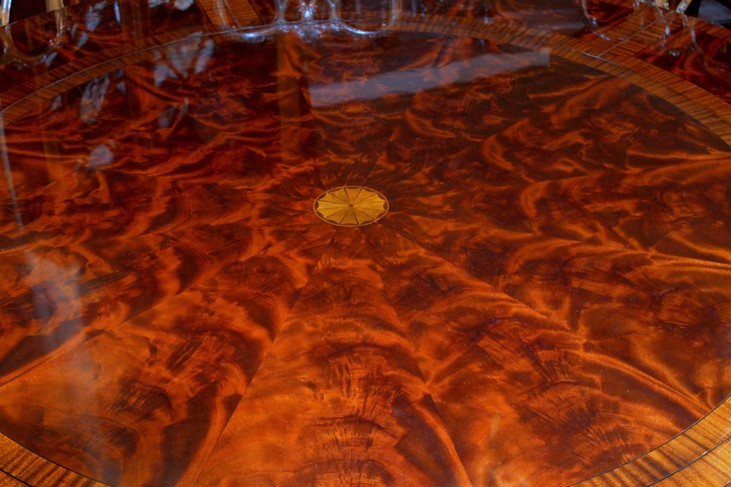 https://a.1stdibscdn.com/benchmade-bookmatched-flame-mahogany-perimeter-leaf-circular-dining-table-for-sale-picture-6/f_18913/f_382502321707060755468/IMG_9001_master.JPG