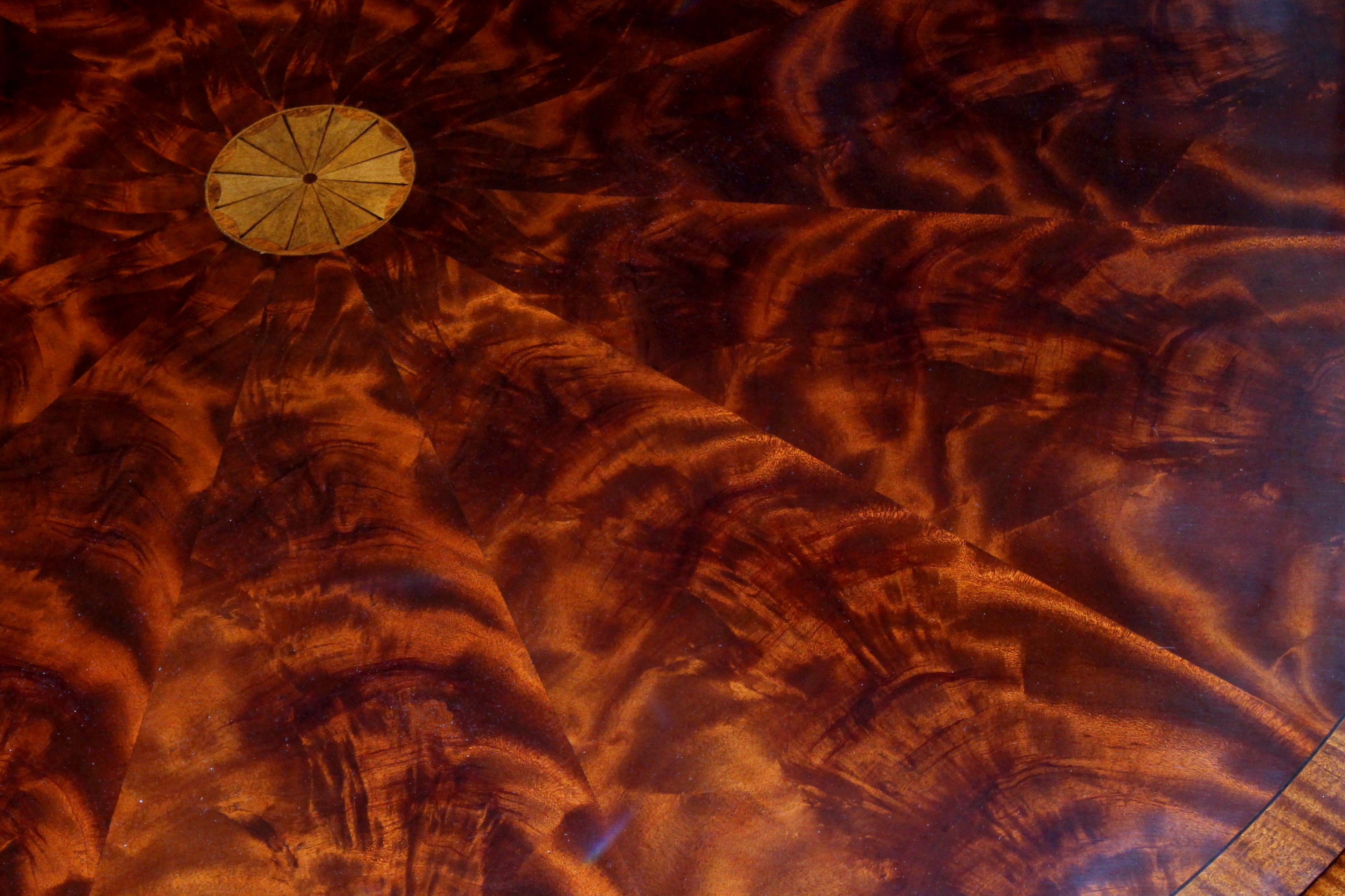 https://a.1stdibscdn.com/benchmade-bookmatched-flame-mahogany-perimeter-leaf-circular-dining-table-for-sale-picture-12/f_18913/f_382502321707060761960/IMG_9007_master.JPG