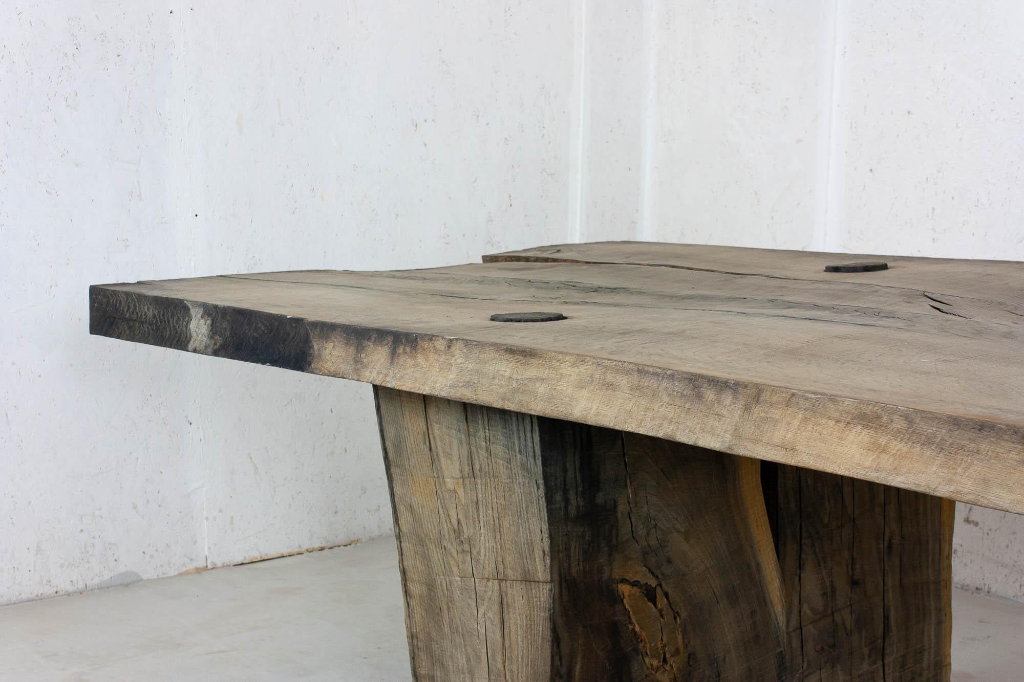 https://a.1stdibscdn.com/sculpted-massive-dining-table-v5-in-solid-oakwood-custom-size-for-sale-picture-4/f_31233/f_234073921618583212769/IMG_9131_master.jpg