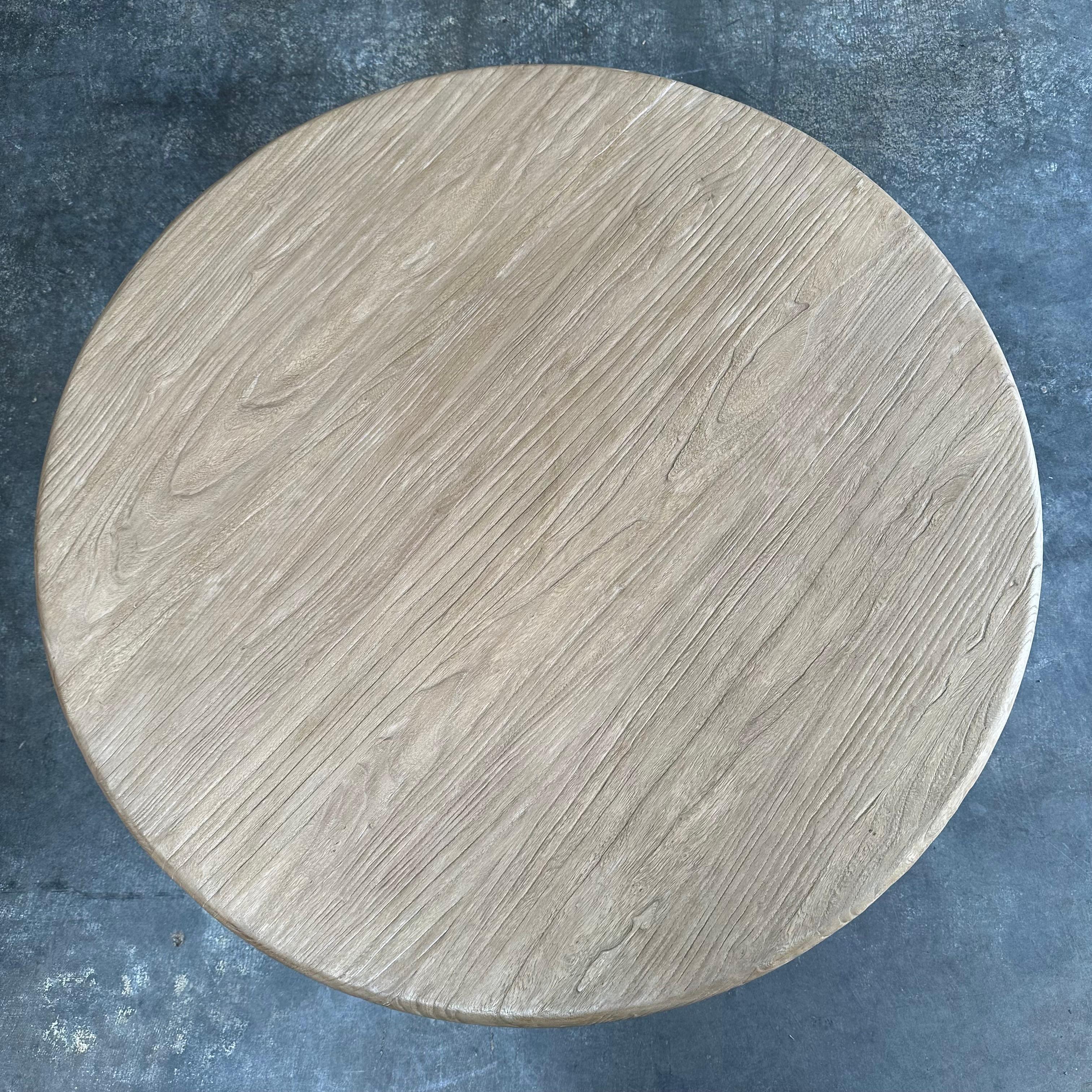 https://a.1stdibscdn.com/custom-reclaimed-elm-wood-round-coffee-table-for-sale-picture-5/f_18223/f_346712421686698008065/IMG_9145_master.jpg